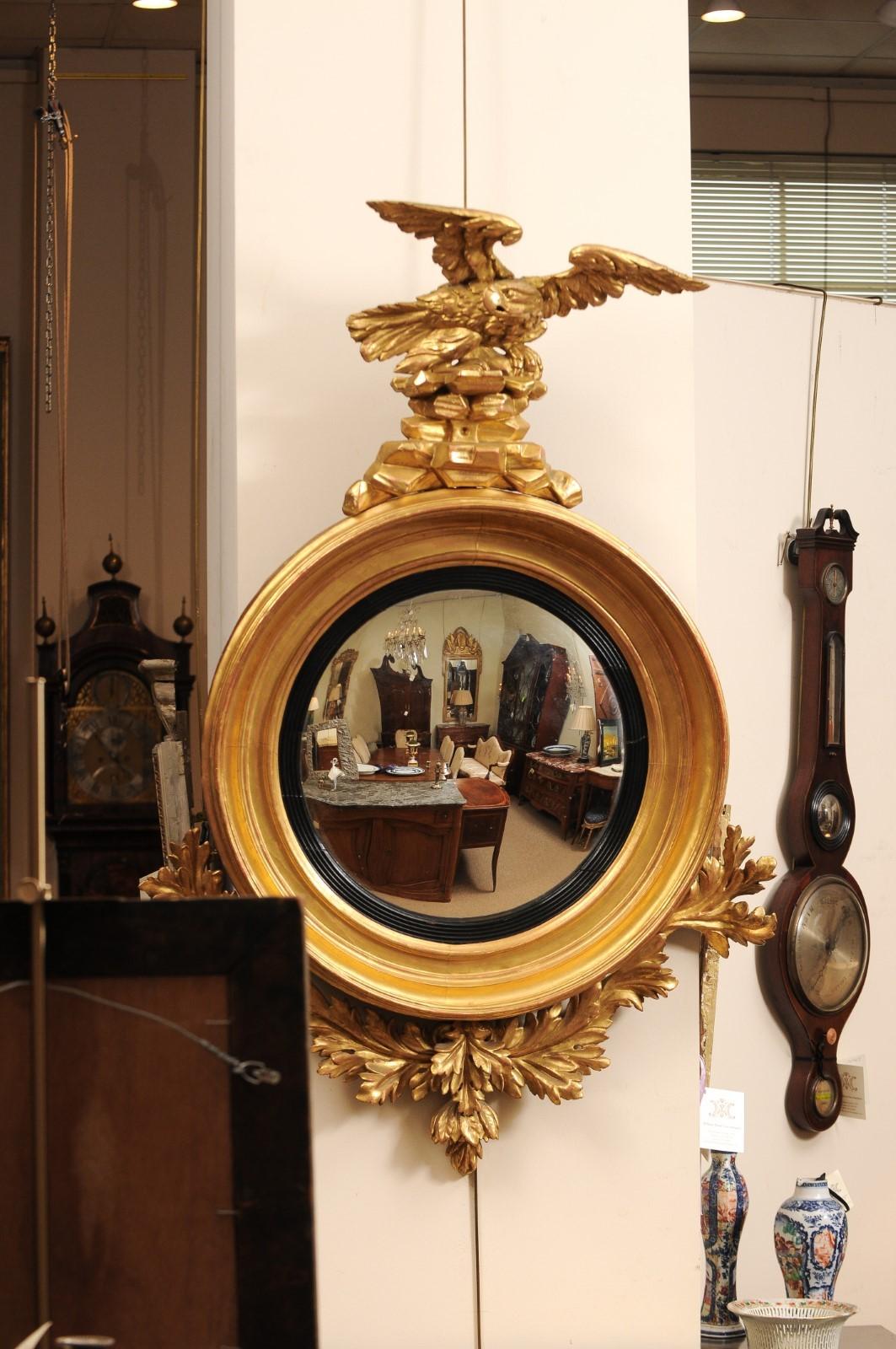  19th Century English Giltwood Bull’s Eye Mirror with Eagle Crest & Convex Mirro In Fair Condition In Atlanta, GA