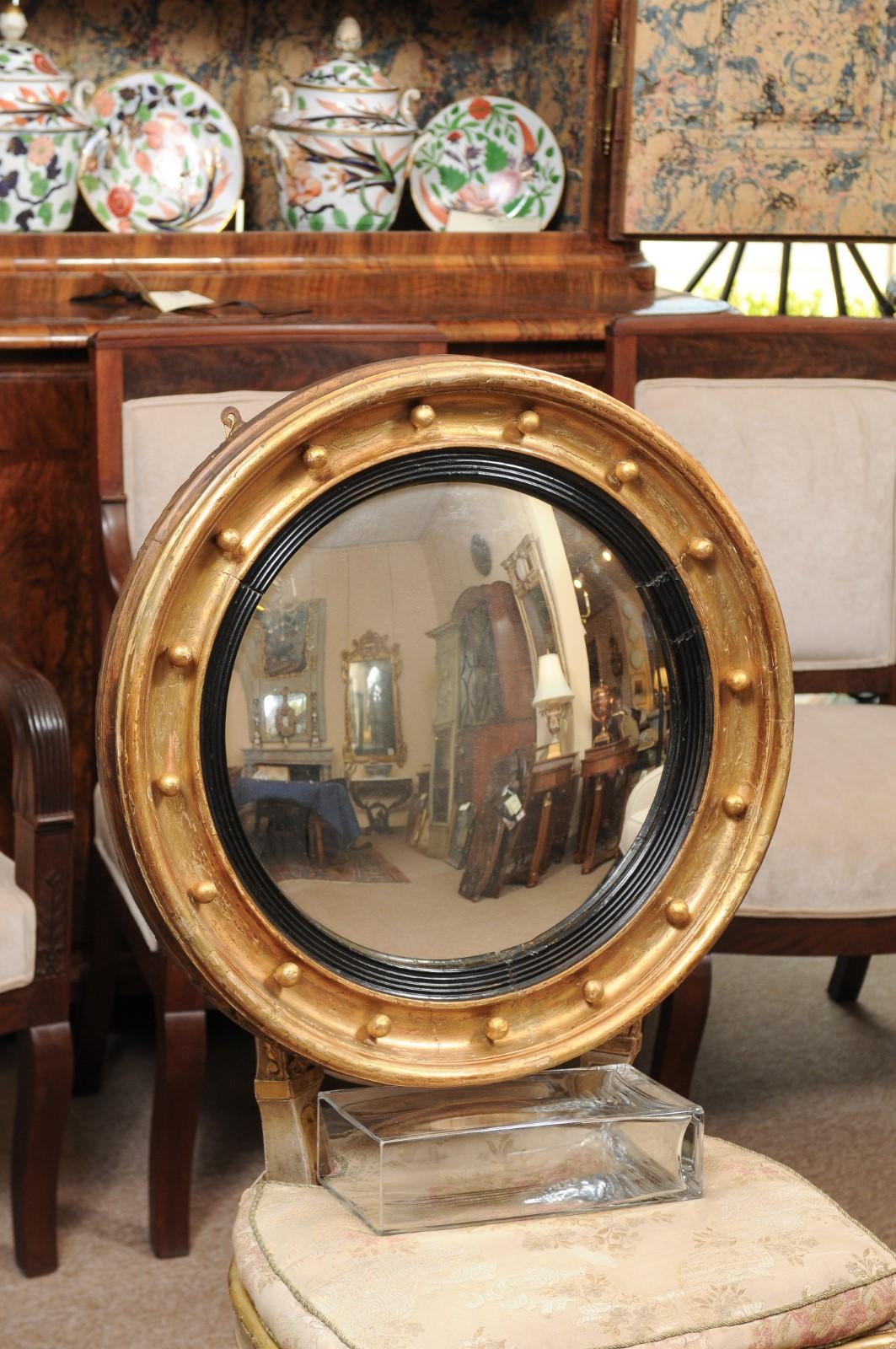 Regency 19th Century English Giltwood Bullseye / Convex Mirror with Ebonized Detail
