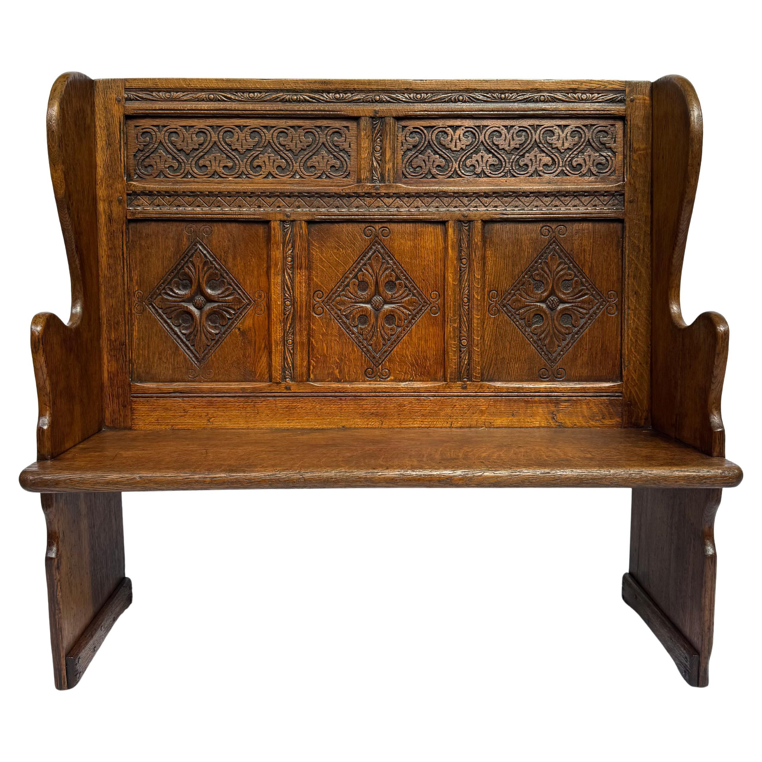 19th-Century English Gothic Revival Oak Bench — A Carved Homage to the Tudor Age