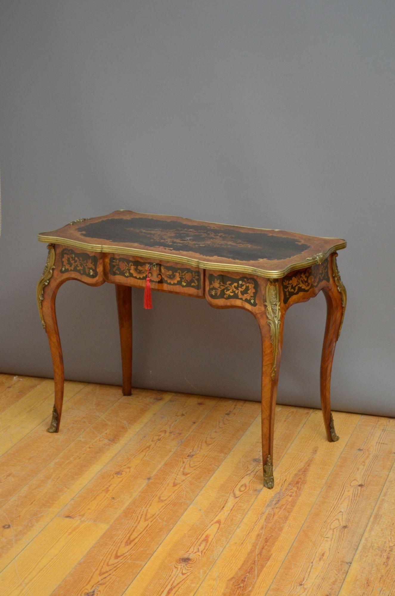 Sn5407 Exquisite English walnut and inlaid side table or occasional table of serpentine outline, having ebony inlay to the top decorated with satinwood floral motifs and ivory cherubs with butterflies above finely inlaid drawer fitted with original