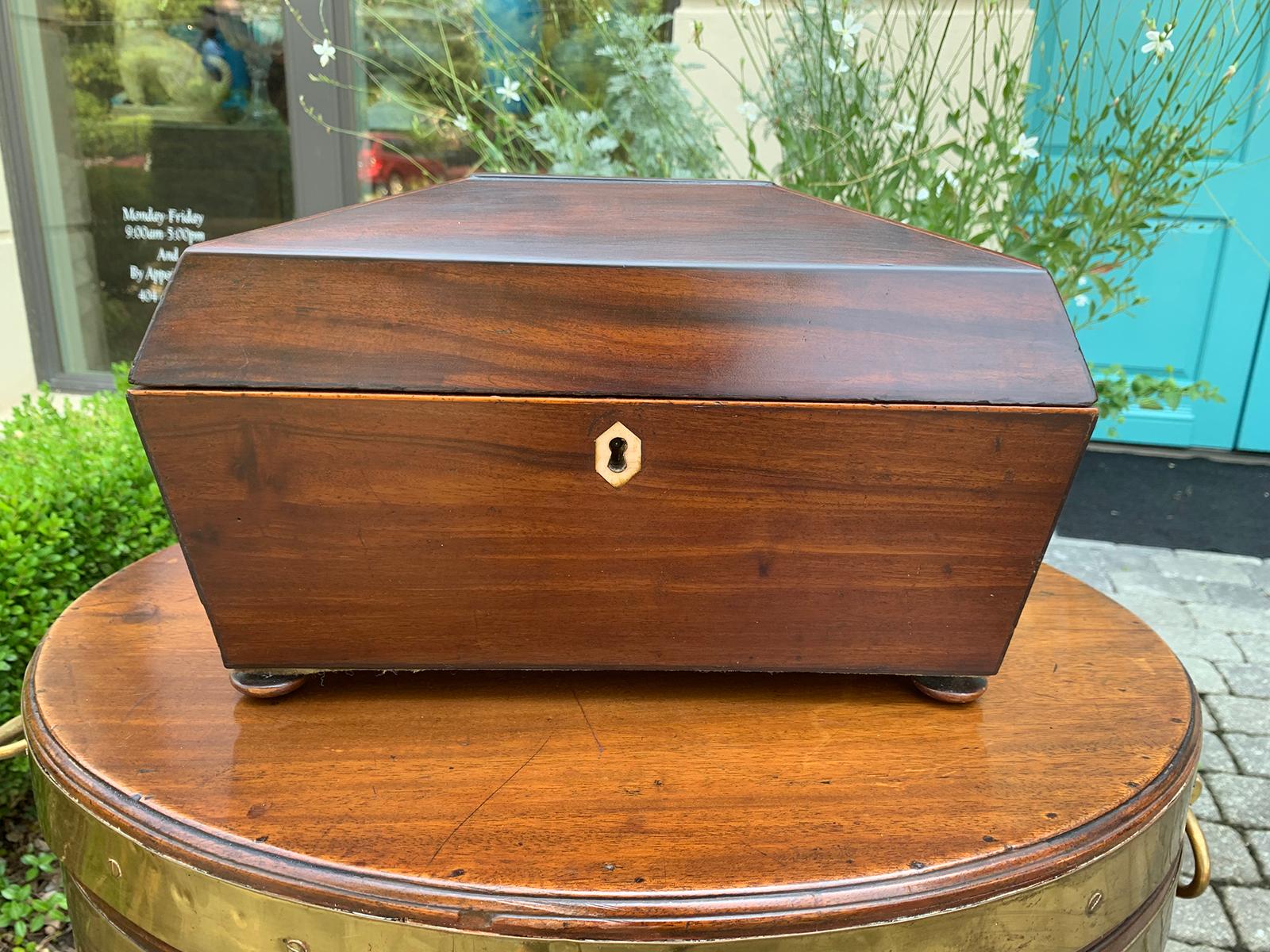 19th century English inlaid tea caddy with crystal Rinser bowl
Rosewood or mahogany.