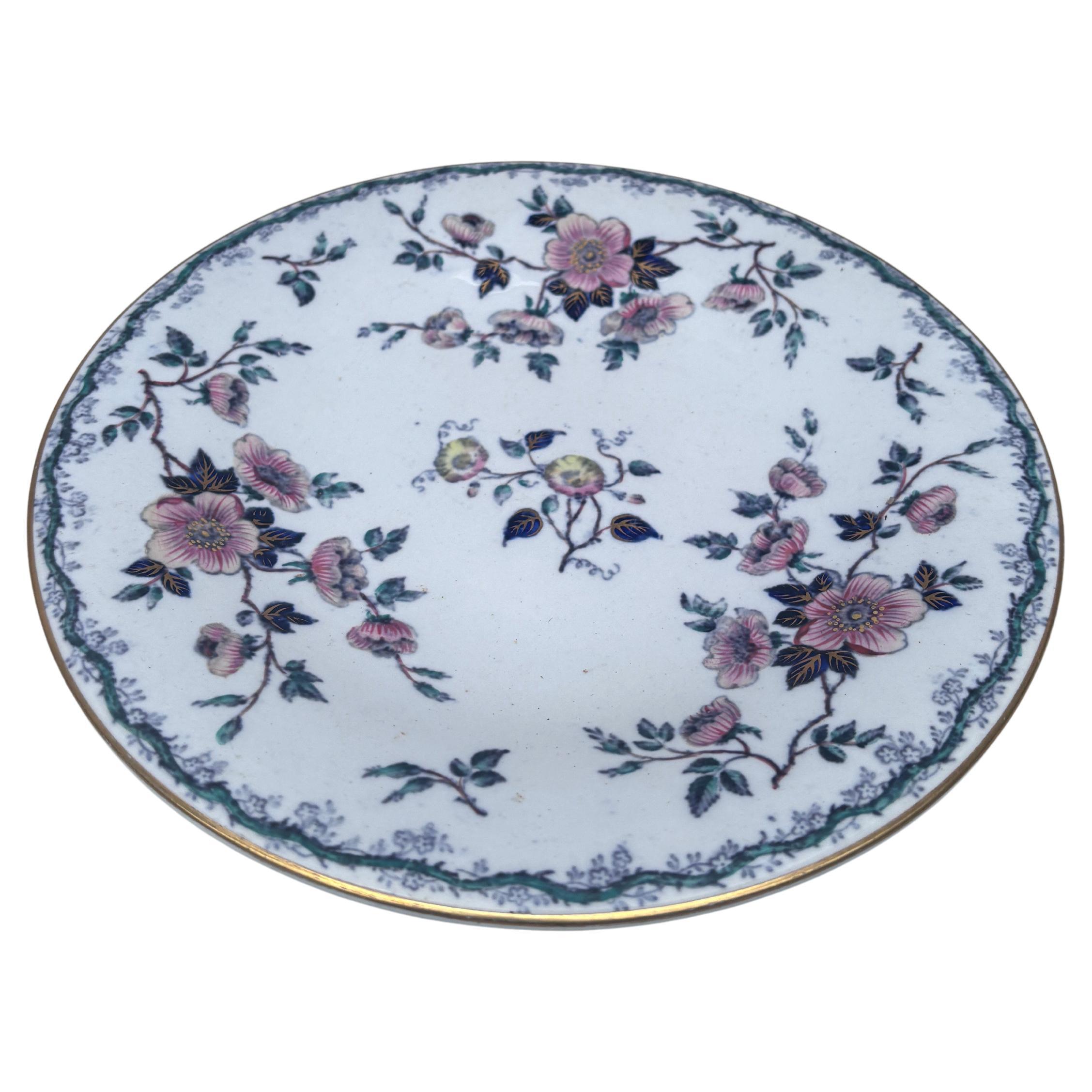Assiette à fleurs en pierre de fer de la Chine anglaise du 19e siècle.
Gloire du matin et roses sauvages.
9 pouces de diamètre.