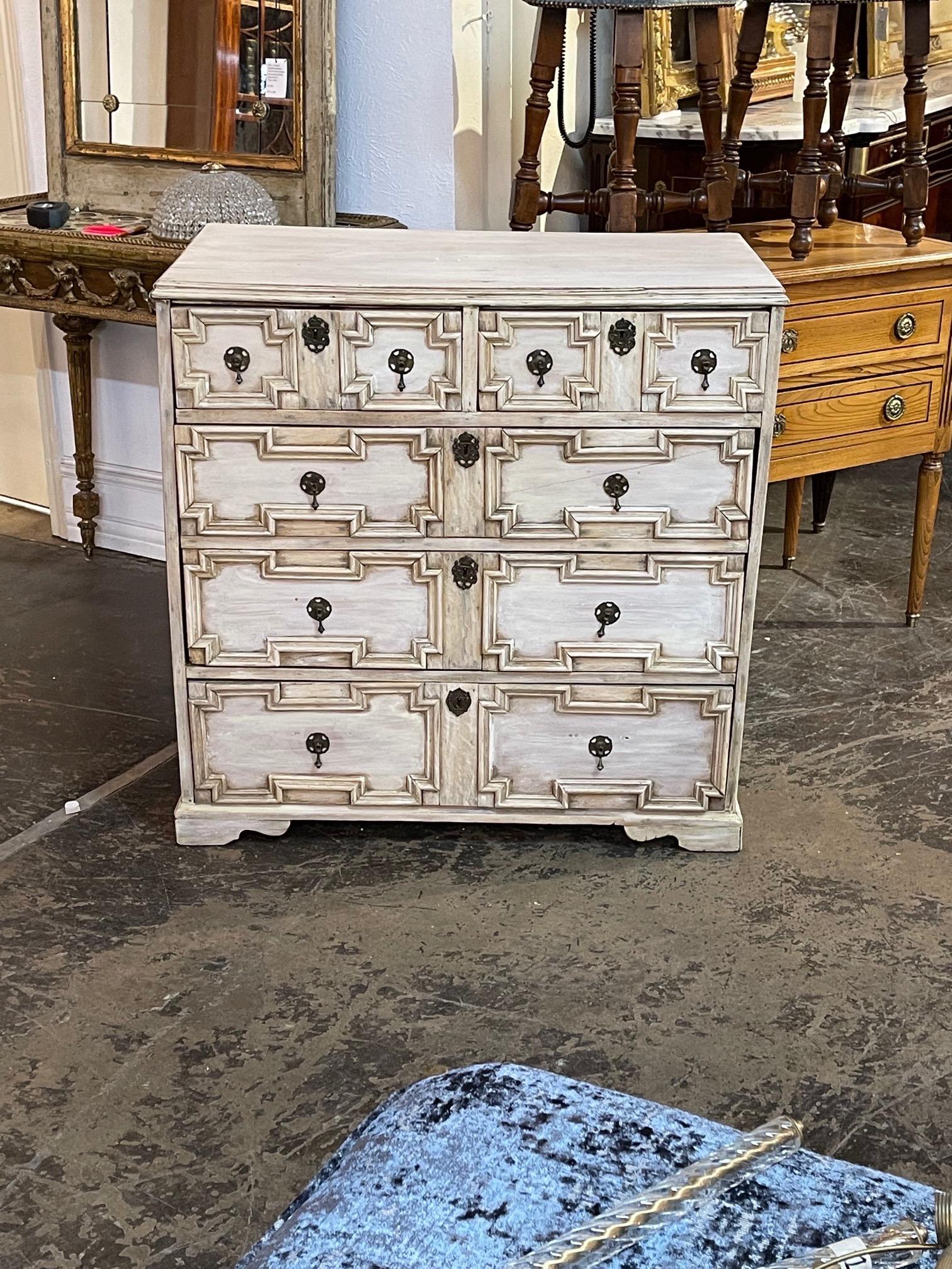 Decorative 19th century English Jacobean bleached mahogany chest with interesting geometric design. Very nice patina and lots of storage as well. So pretty!!
