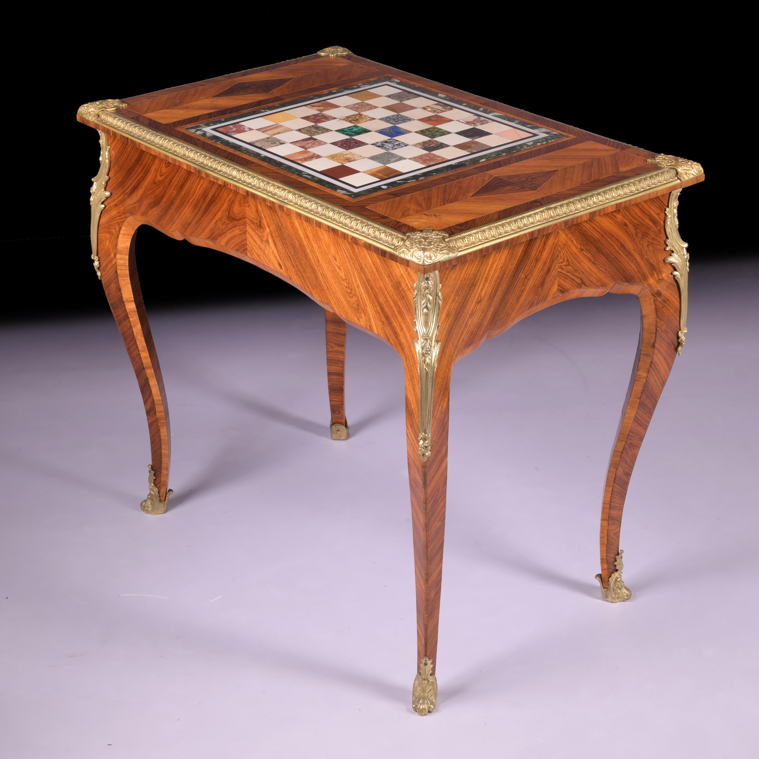 An Exceptional 19th century specimen table, constructed in Kingwood and Gonzalo alves, with the rectangular top centred by a specimen marble inset chess board including Porphyry, Malachite and Lapis Lazuli within multiple bandings, the gadrooned