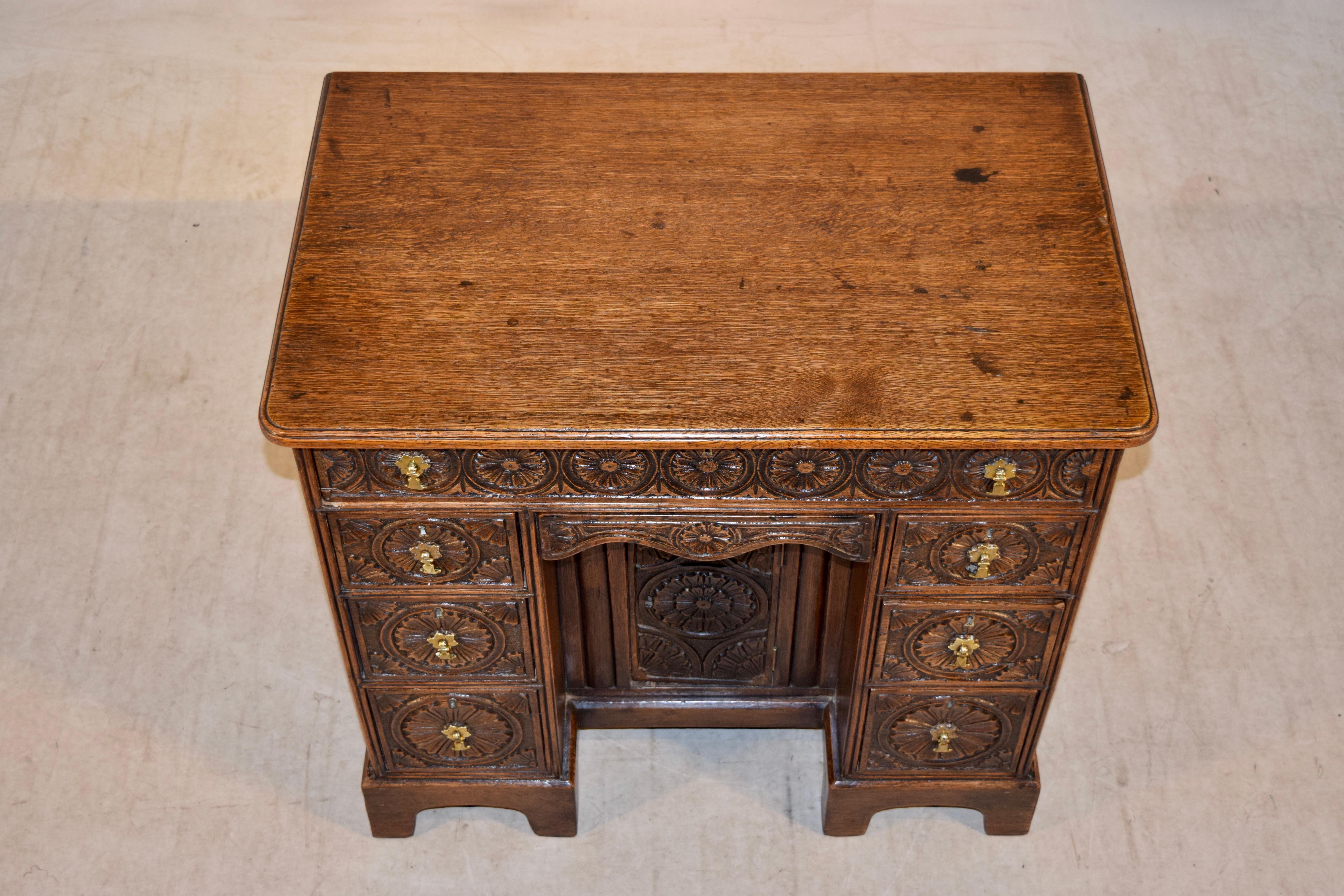 Hand-Carved 19th Century English Knee Hole Desk For Sale