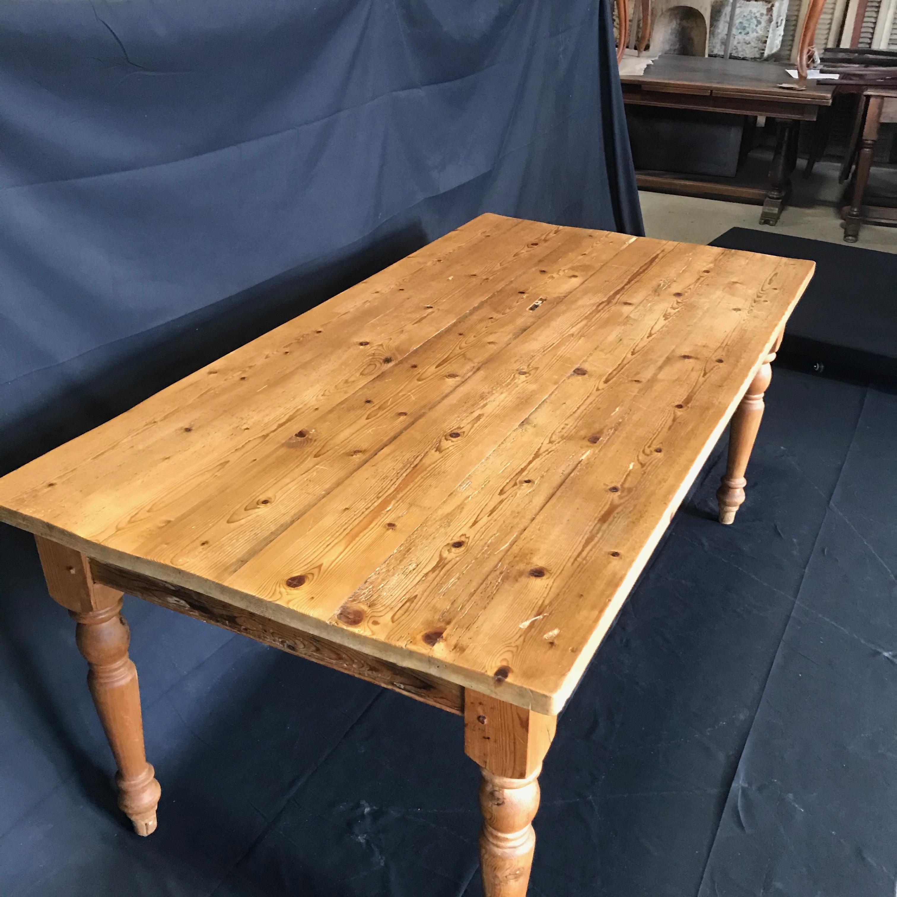 English pine dining table, circa 1880. A beautifully maintained knotty pine top. Will comfortably seat eight.
#4997


Measure: H skirt 24.25”.