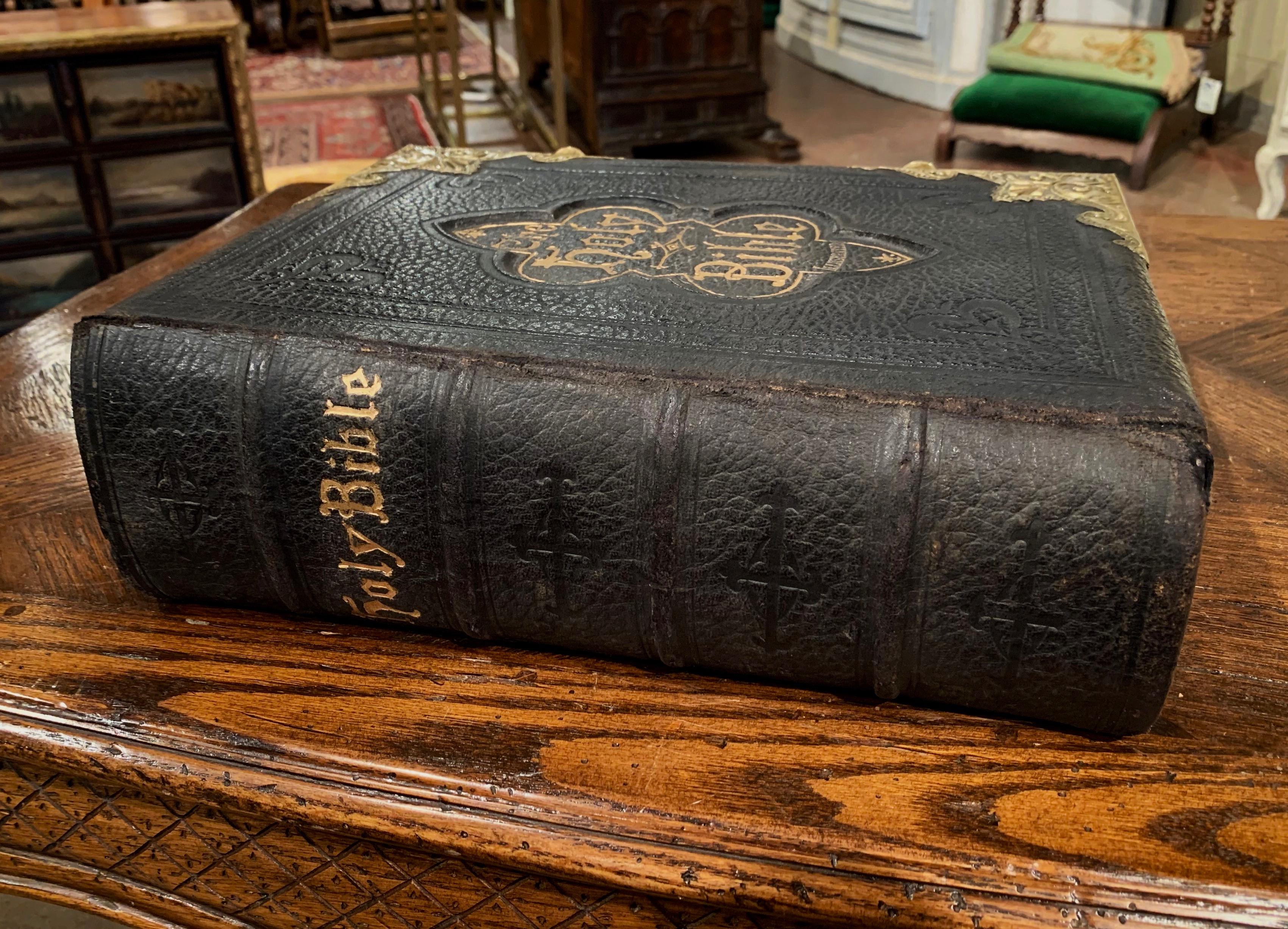 This beautiful antique family bible was printed in England circa 1870, with an abridgement of the commentaries of Scott and Henry, and containing also many thousand critical and explanatory notes selected from the Standard Authors of Europe and
