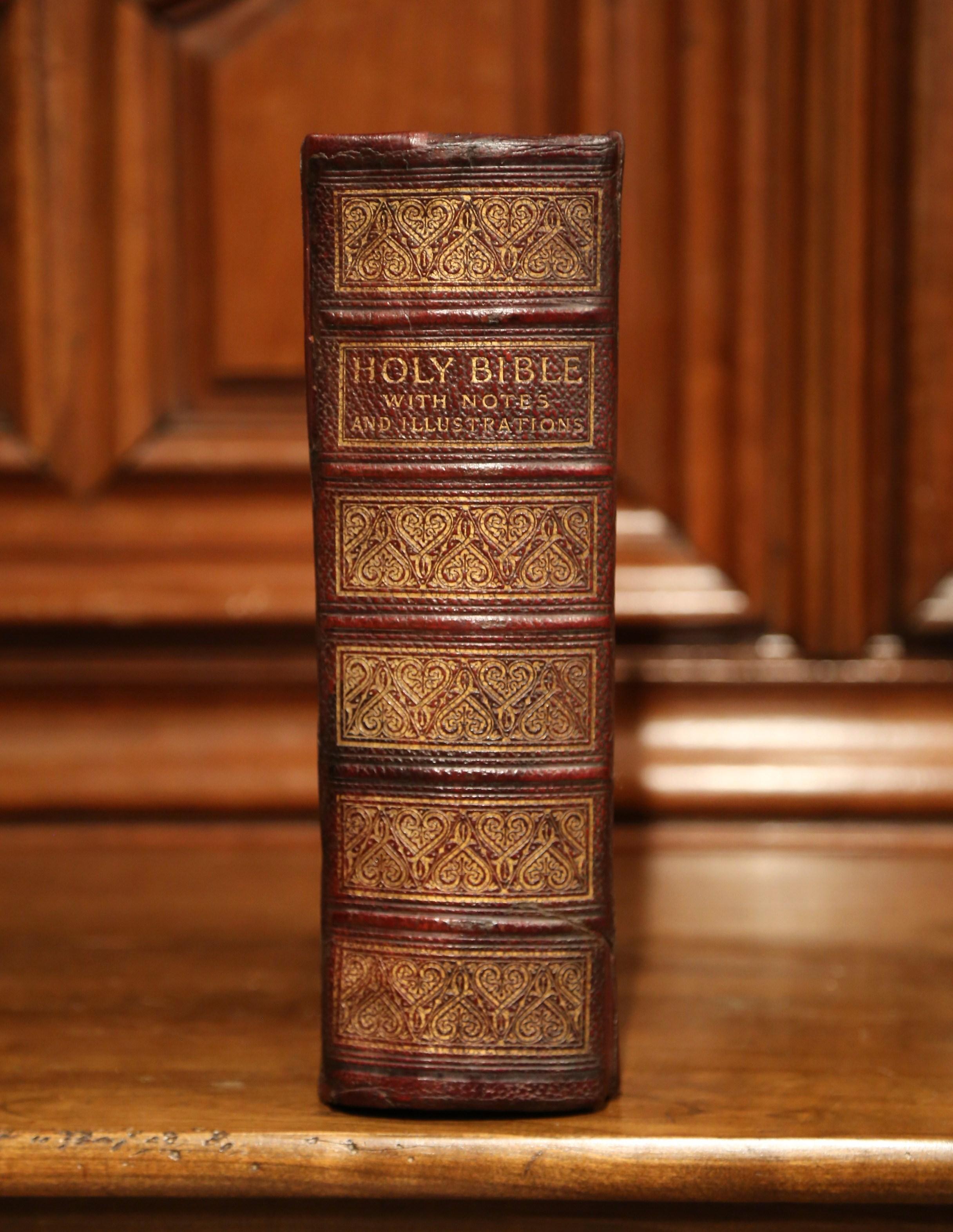 This beautiful antique bible by Rev John Brown was printed by Blackie & Son Limited in Glasgow, Edinburgh and London, circa 1880. The book flaunts an engraved brown leather and gilt covering, and is embellished with two brass locks. Inside, the