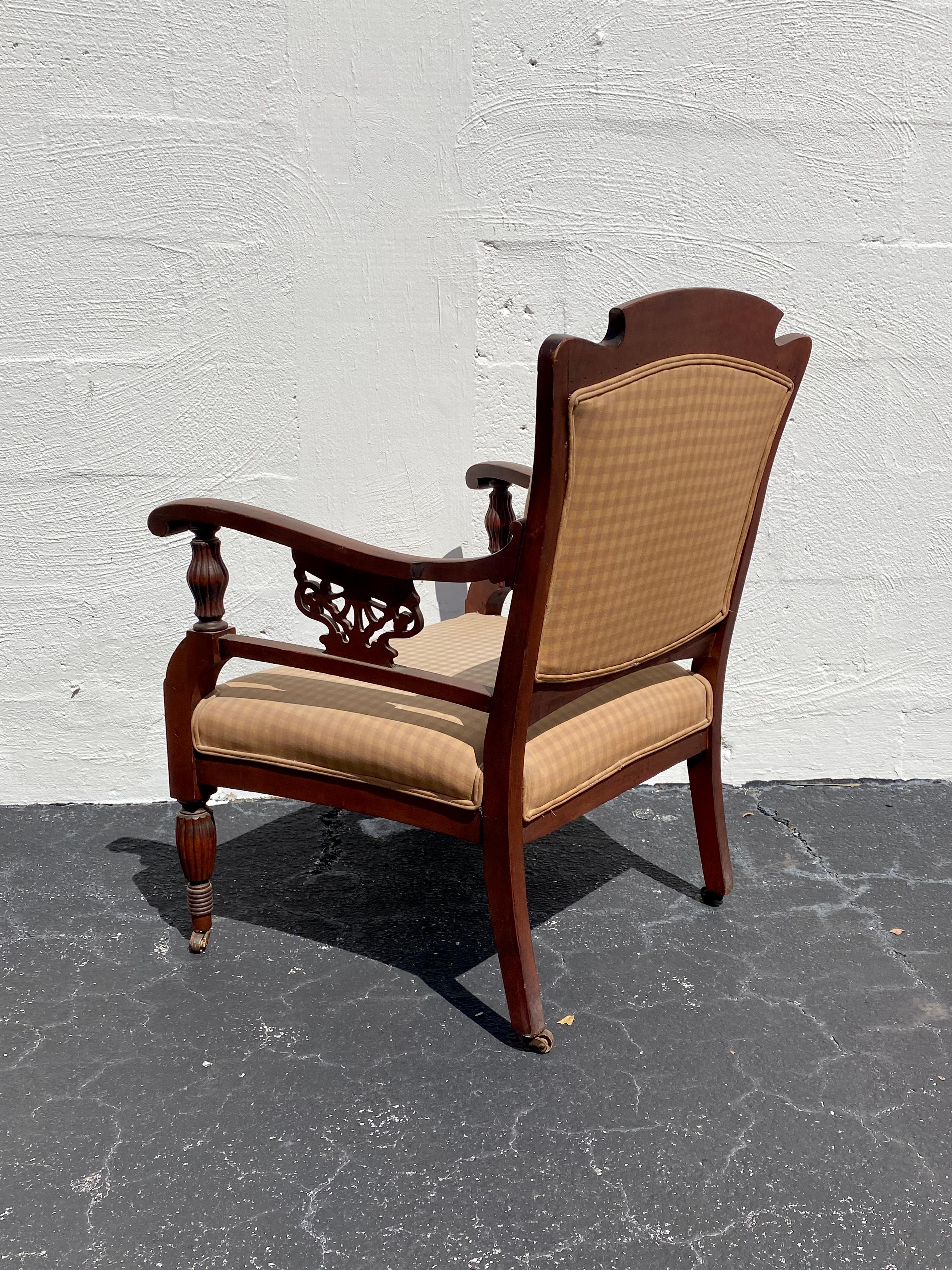 Chaise de bibliothèque anglaise du 19ème siècle sur roulettes en vente 1