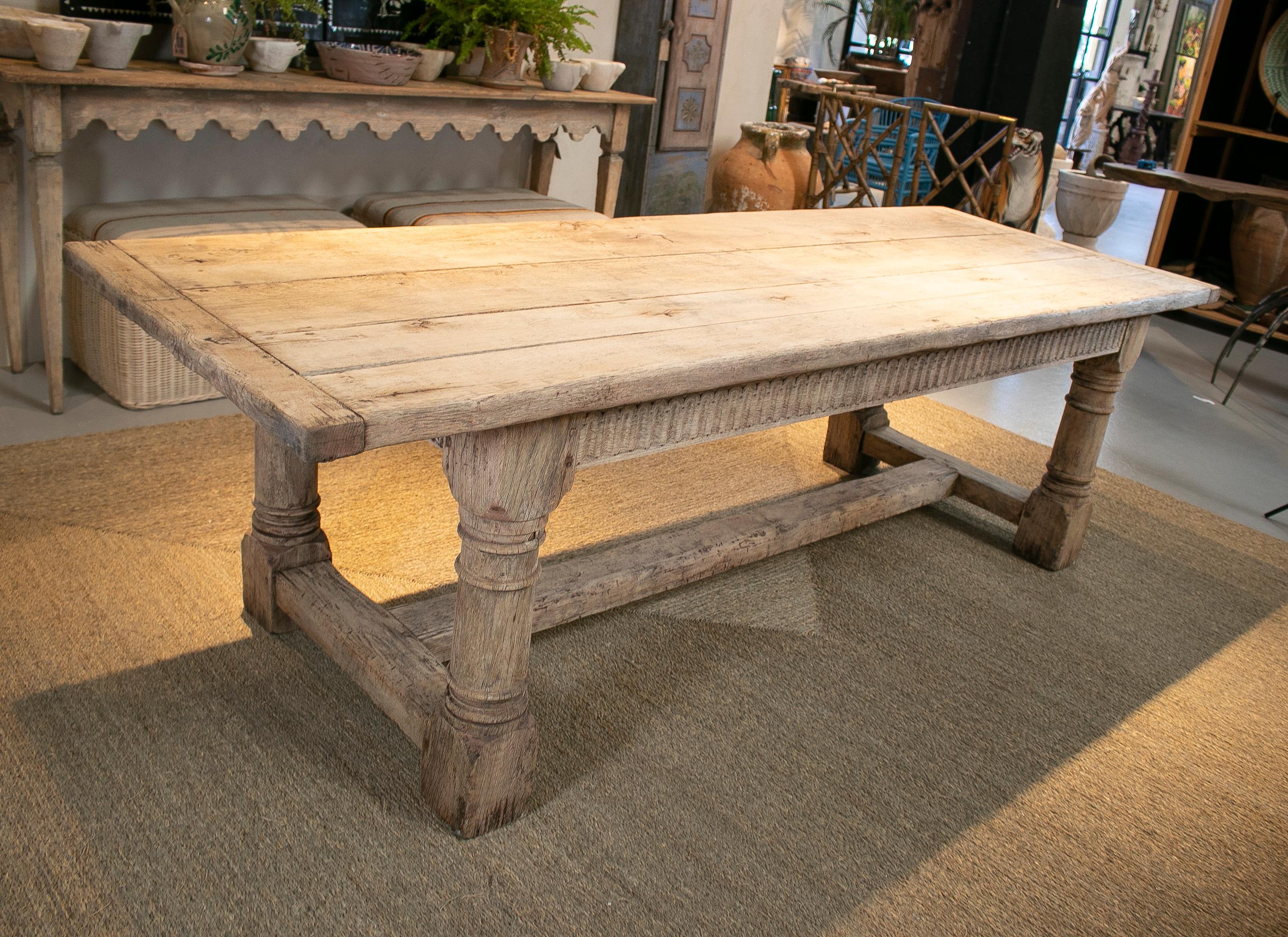 Antique 19th century English lime washed wood rustic dinning table with crossbeam legs.