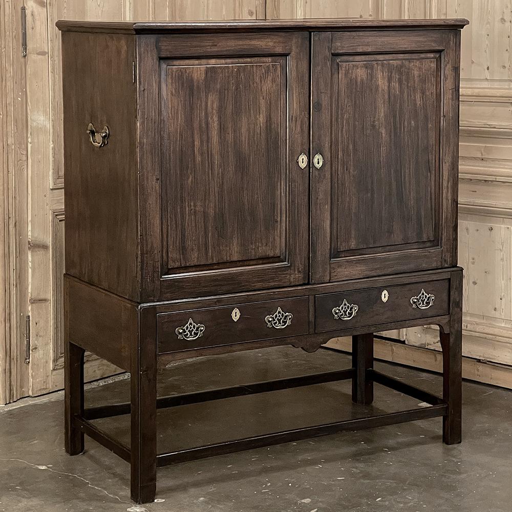 19th century English linen press ~ silver chest was designed for refined living, handcrafted to store a family's entire collection of table linens and silverware, all raised up on legs to create a cabinet exceptionally easy to access! Two piano