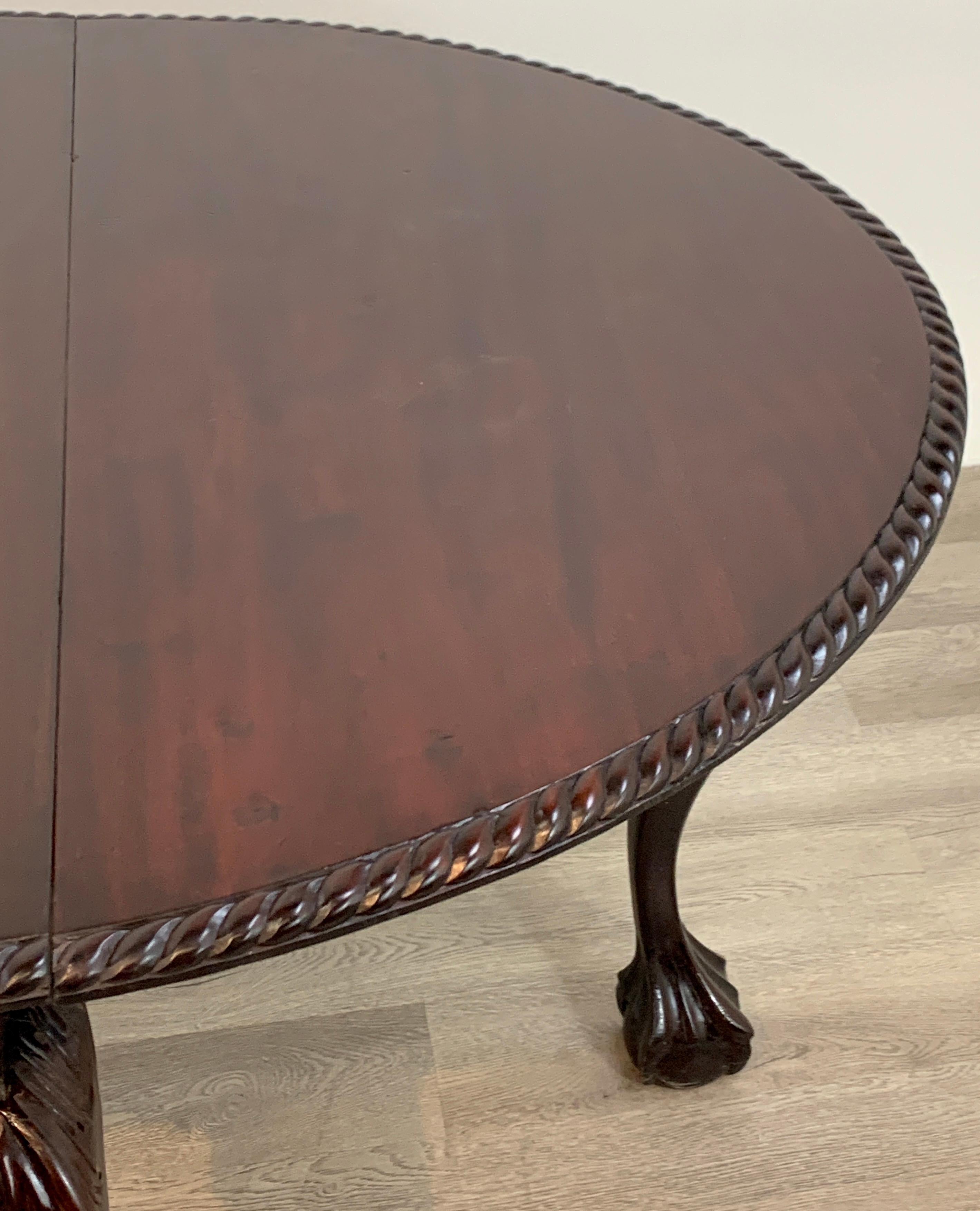 19th Century English Mahogany Ball and Claw Foot Tuck Away Dining Room