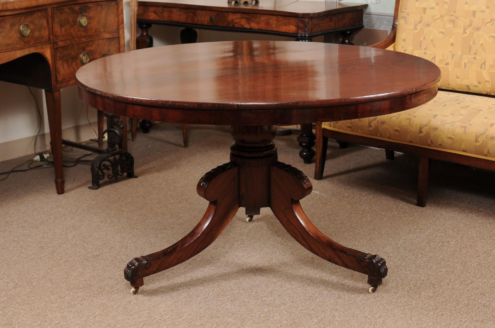 19th Century English Mahogany Center Table with Pedestal Base & 3 Splayed Legs with Paw Feet
