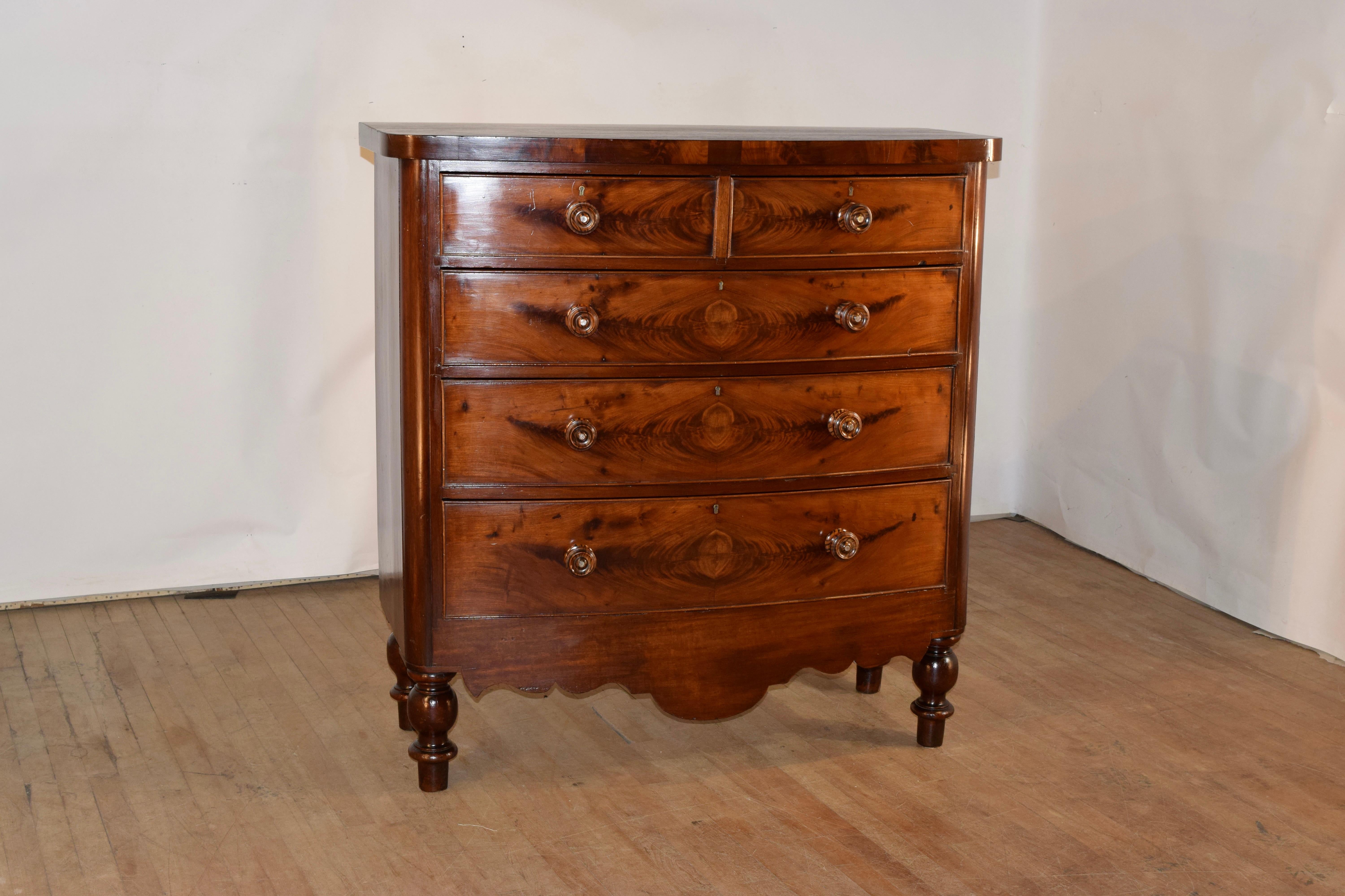 Superb quality 19th century mahogany chest of drawers from England with a lovely grained top and banded sides on the top which have flame mahogany veneer for added interest. The case is elegant in its simplicity and has simple sides and two over