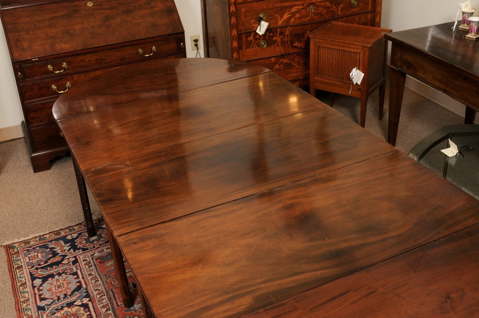 19th Century English Mahogany Dining Table with Carved Legs & 2 Leaves.