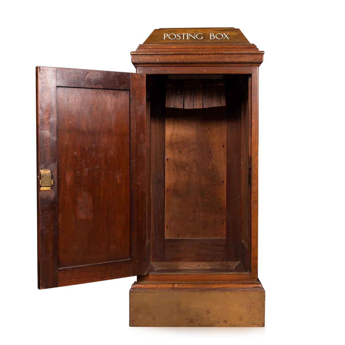 Antique 19th century English hotel post box constructed in solid mahogany with a brass letter box, a hindges door with a lock and key. Post boxes of this size were usually installed in large hotels and gentlemen's clubs.

Beautiful piece of period