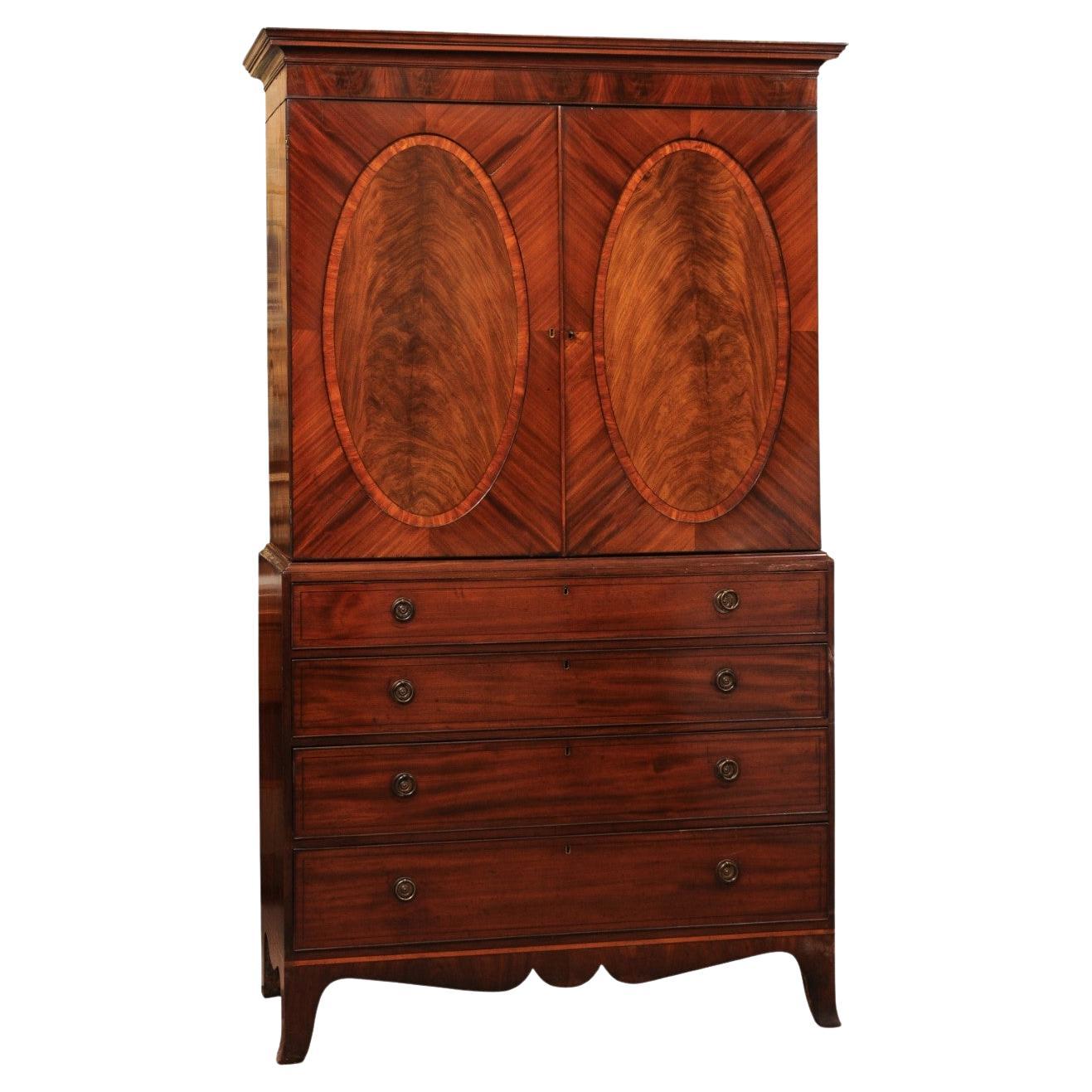 19th Century English Mahogany Linen Press with Oval Paneling and Crossbanding en venta