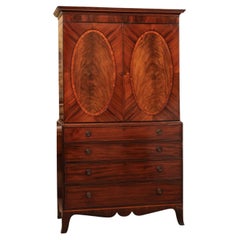 19th Century English Mahogany Linen Press with Oval Paneling and Crossbanding
