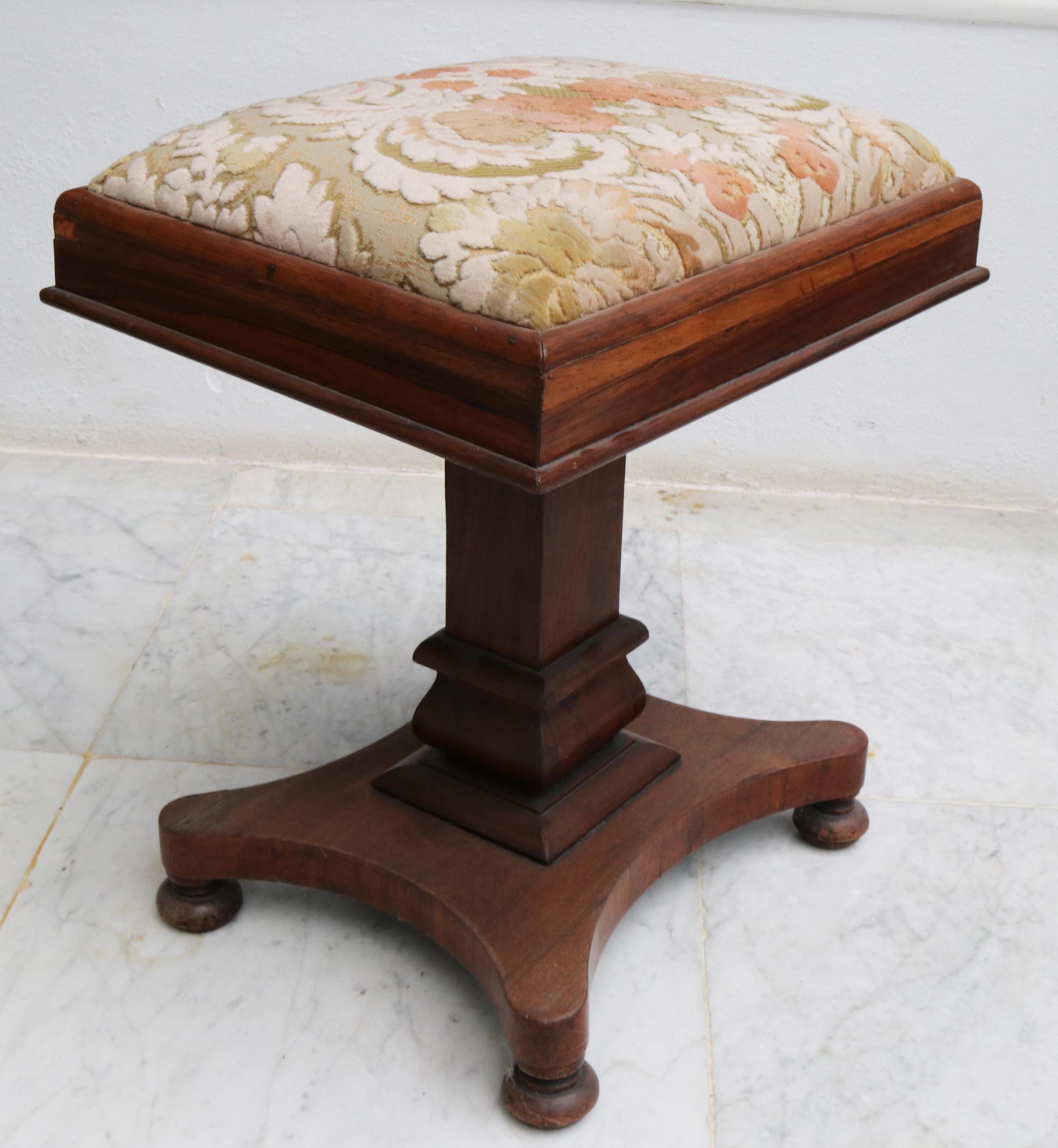 19th Century English mahogany claw foot pedestal side table with upholstered flower pattern velvet top.