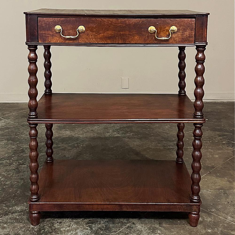 19th Century English mahogany tea server ~ sideboard is a wonderful specialty piece that will be the perfect choice for that special narrow space, nook or niche! Hand-crafted from exotic imported mahogany, it features a single full width drawer