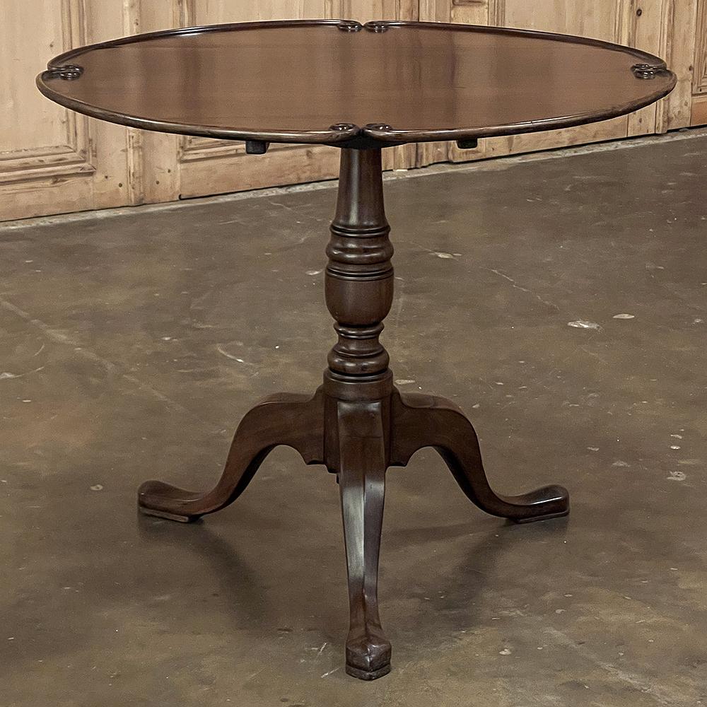 19th century English mahogany tilt-top end table is an ingenious invention that most agree originated with the English but who knows for sure? This example, rendered from what was then plentiful sources of mahogany from the Americas. The solid plank