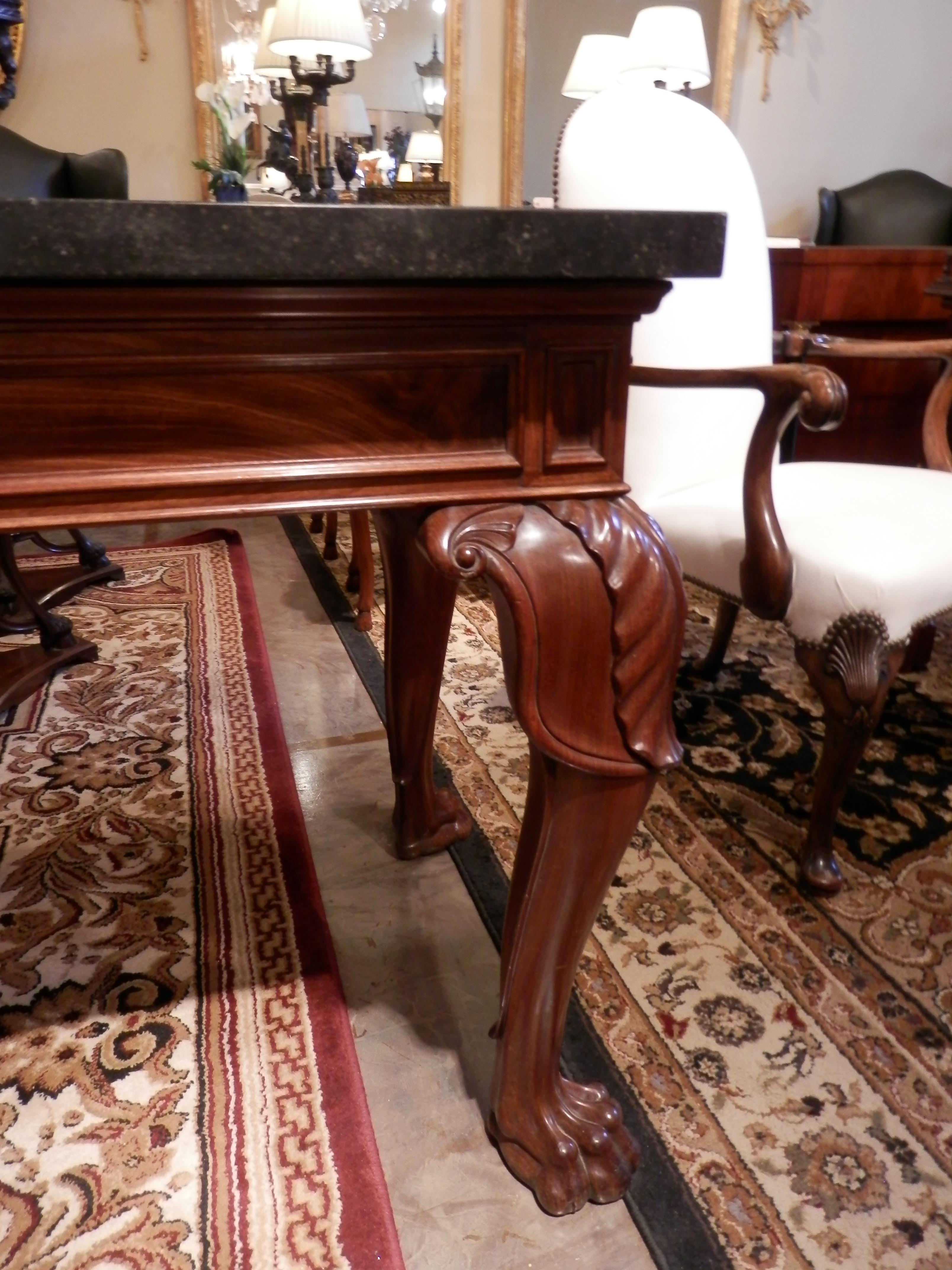 Beautiful 19th century William 4th mahogany and marble topped console. Boldly carved acanthus knees with heavy pawed feet.