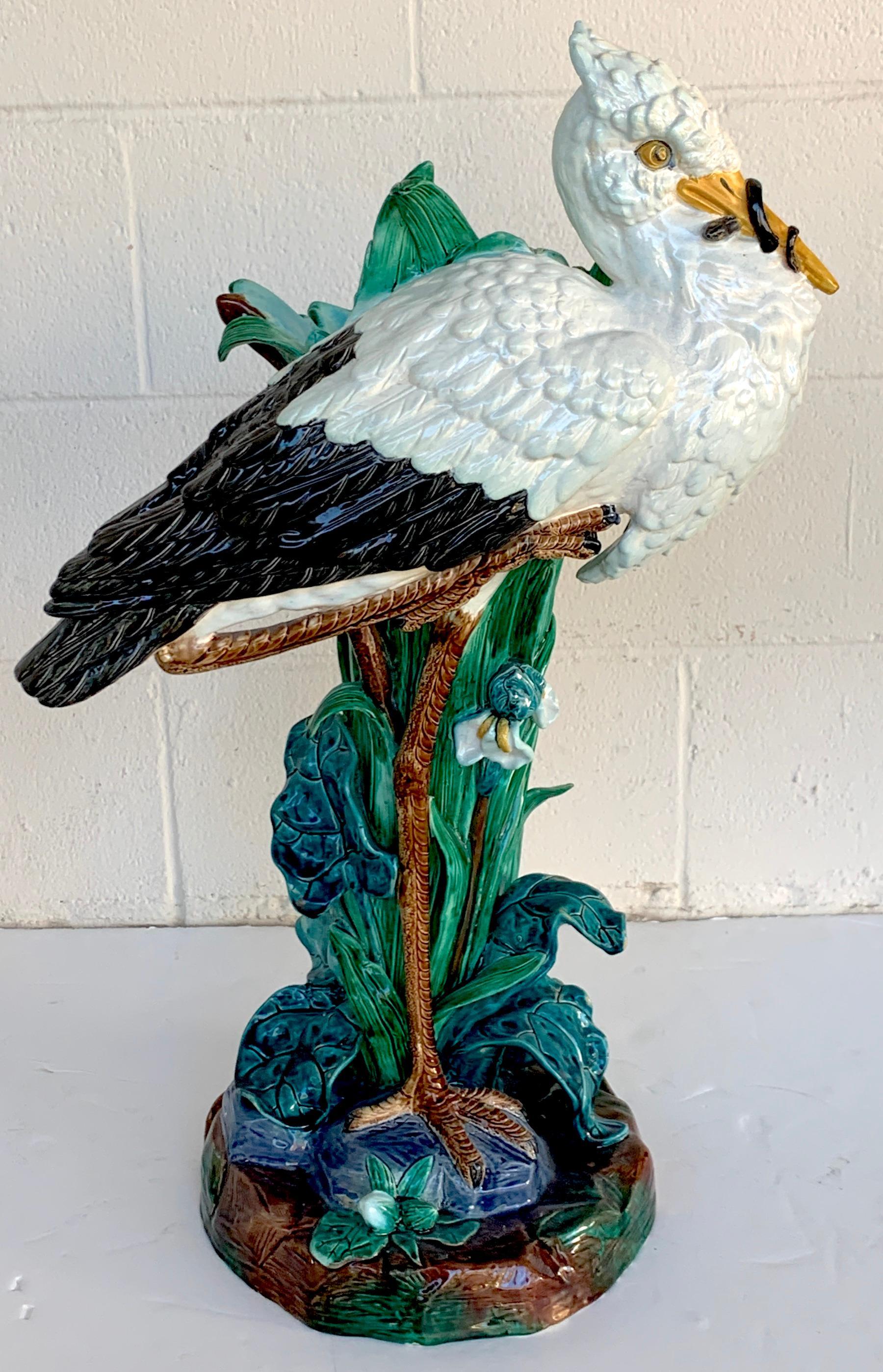 19th century English Majolica stork floor vase by Joseph Holdcroft, a fine and large example of the iconic naturalistic floor vase. Stamped 'Holdcroft' on the 11-inch diameter base.