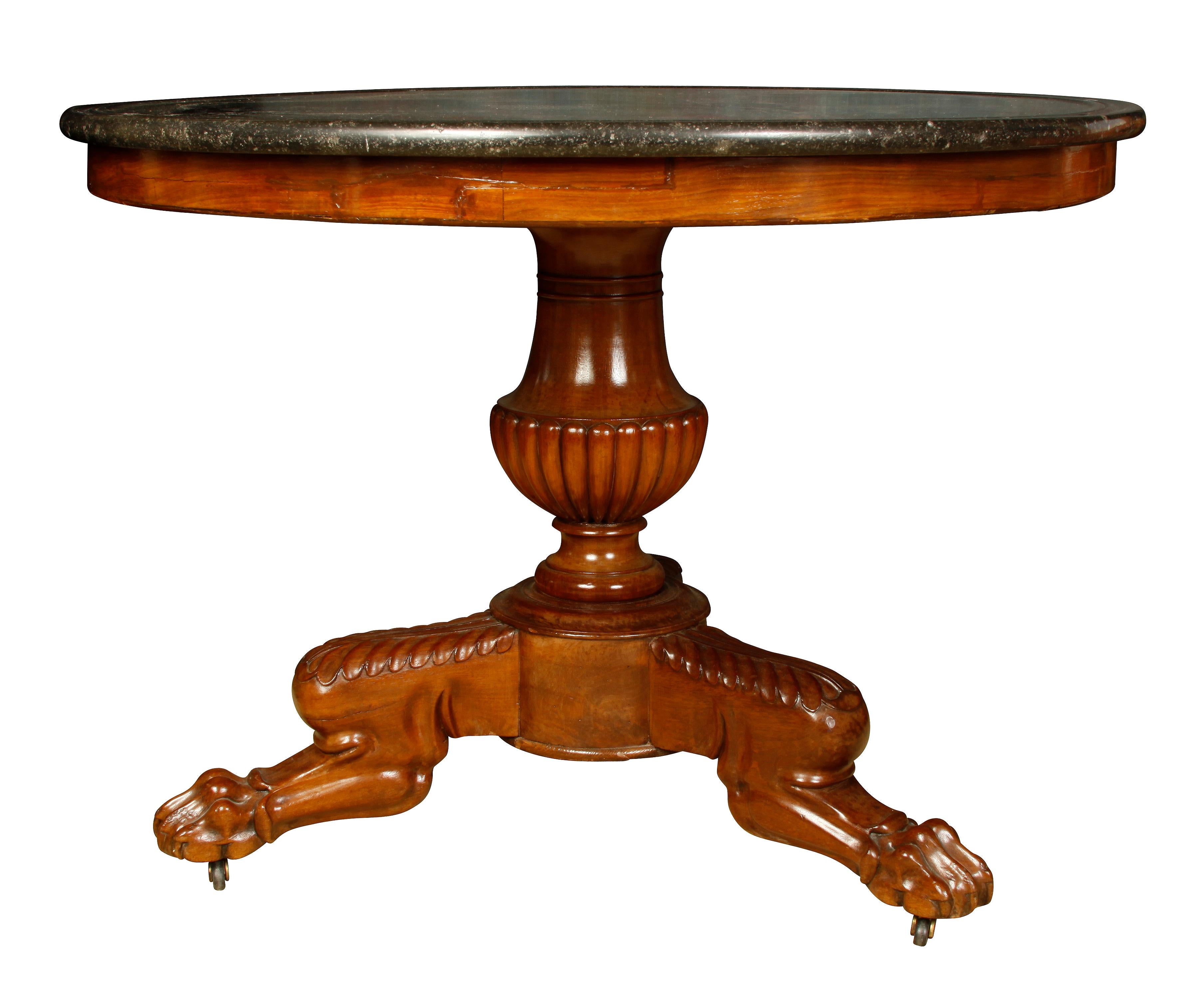 19th century English marble-topped wood pedestal table, claw foot base with a purbeck marble top.