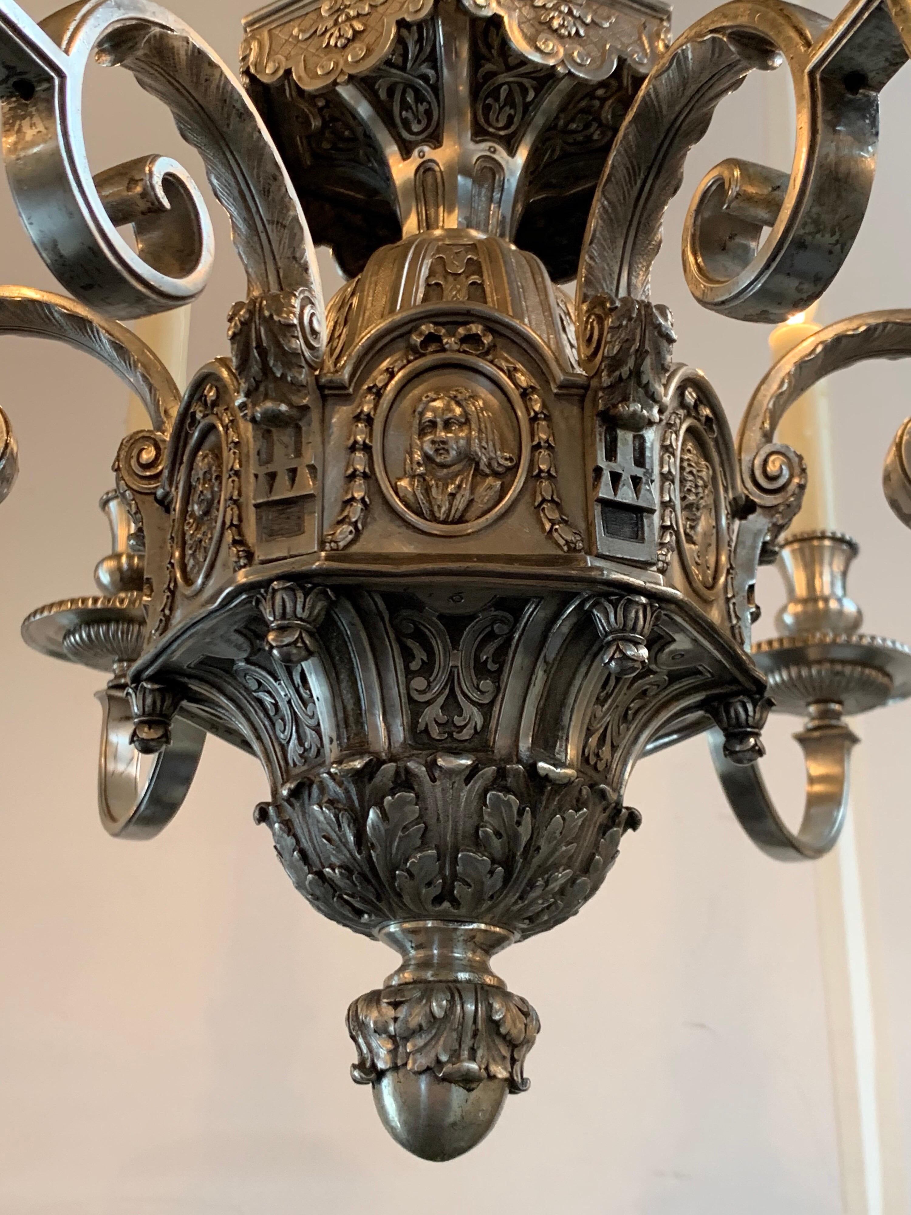 Beautiful 19th century English neoclassical style chandelier with 6 lights. Gorgeous silver over bronze finish with amazing decorative details.