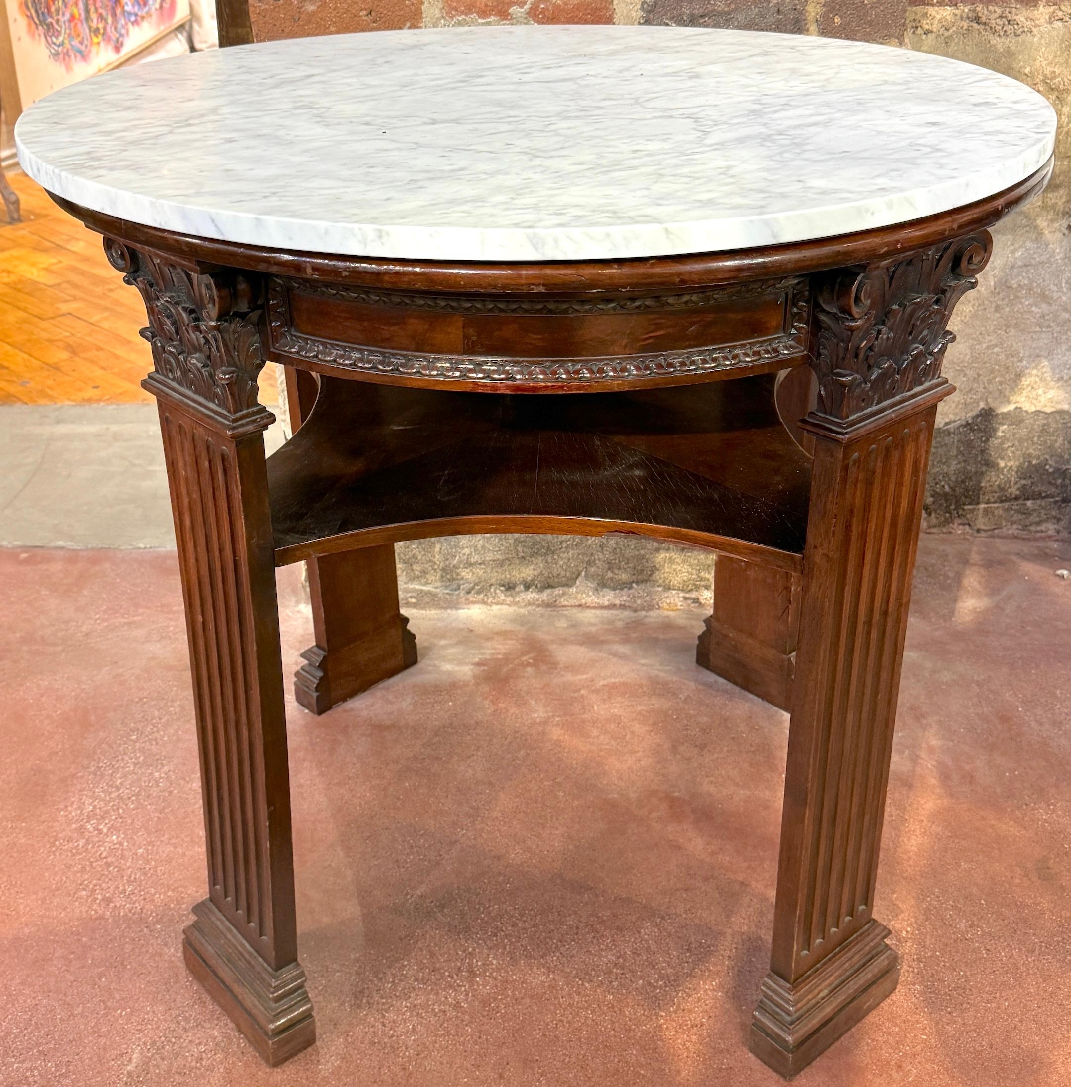 19th Century English Neoclassical Corinthian Column Marble Top Library Table, England, Circa 1880

A superb 19th-century English Neoclassical Corinthian Column Marble Top Library Table, England, circa 1880. This architectural table stands 31.75