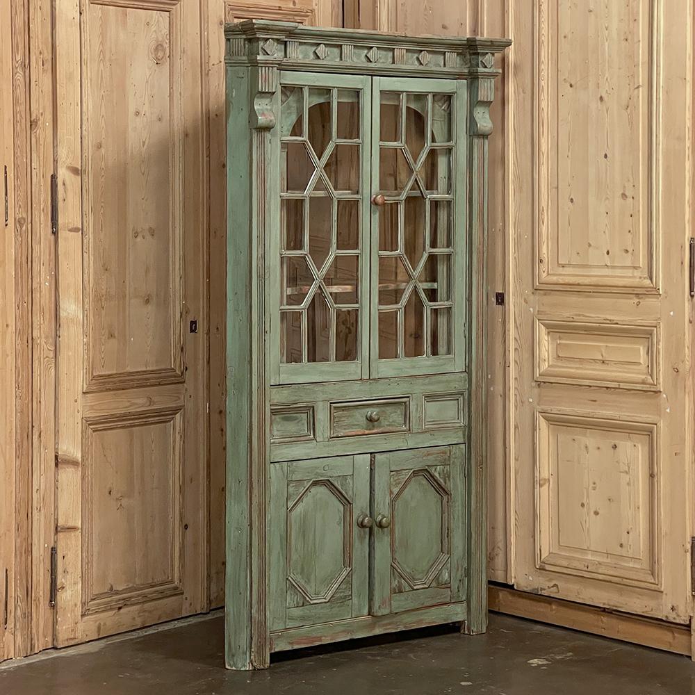 19th Century English Neoclassical painted corner cabinet ~ bookcase is a splendid ode to the architecture of the ancient Greeks and Romans, with a subtle English influence! Mitered corners project the piece out into the room, yet its impact on the