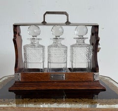 19th Century English Oak and Cut Crystal Three-Bottle Tantalus