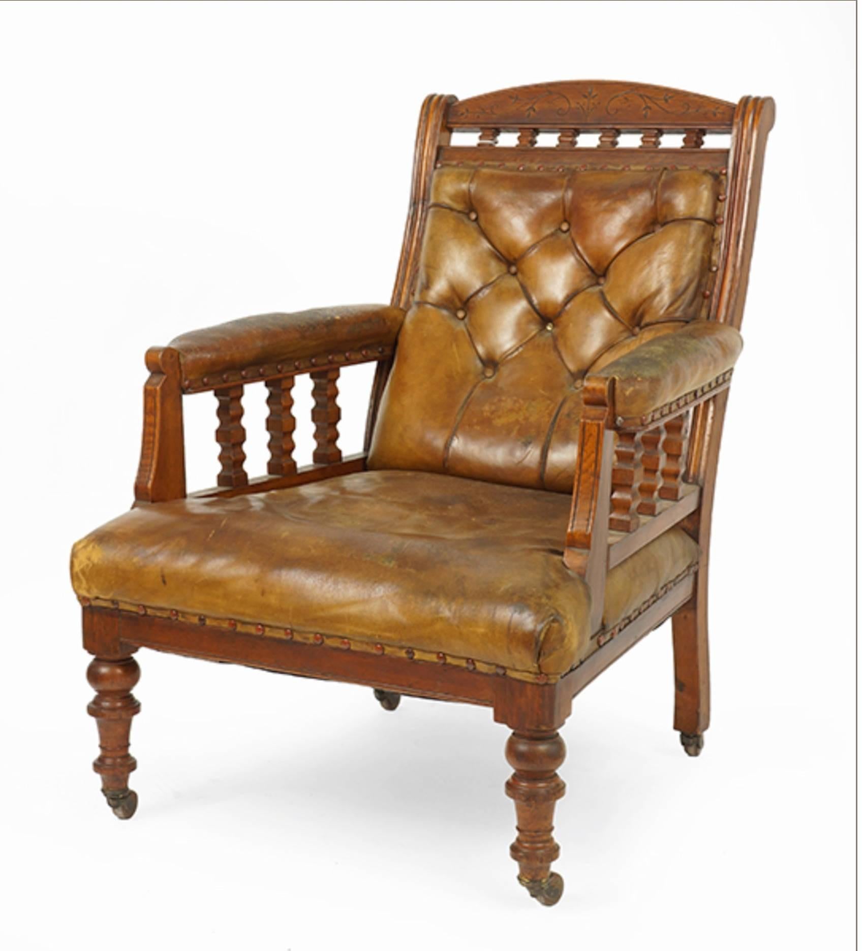 19th century English oak and leather library chair. Lovely old patina.