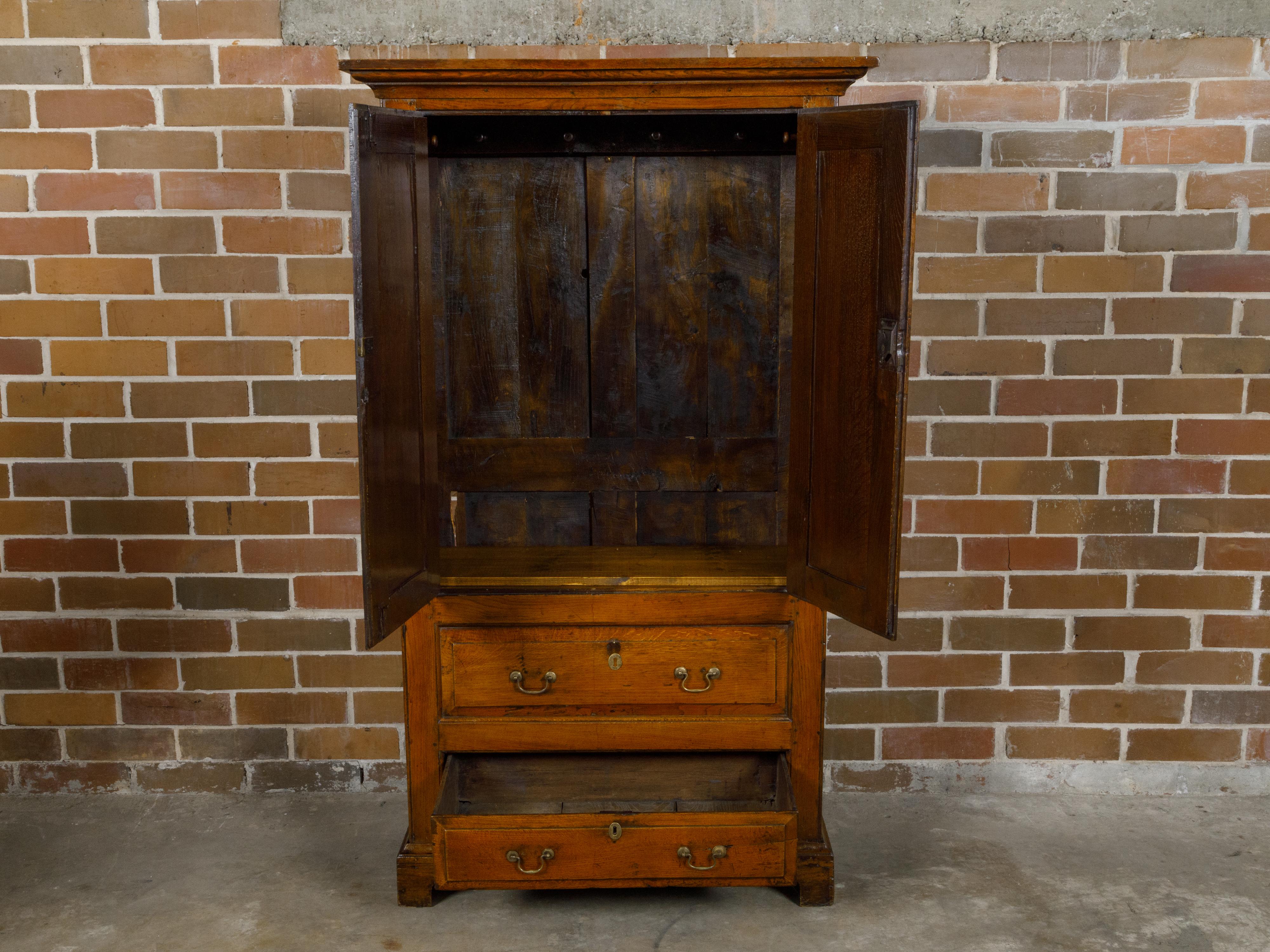 19th Century English Oak Armoire with Carved Doors, Bracket Feet, Brass Hardware For Sale 6