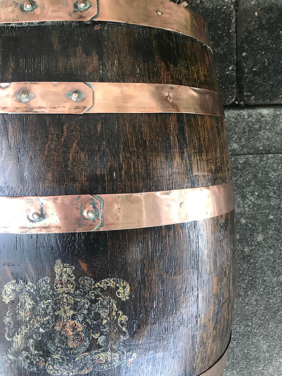 19th century English oak barrel with crest.