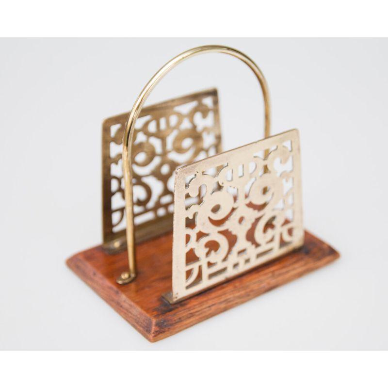 A fine 19th-century oak and solid brass letter holder made in Birmingham, England by William Tonks & Sons. Maker's mark W. T & S impressed on reverse. It's decorative and functional, perfect as a gift or desk accessory.


