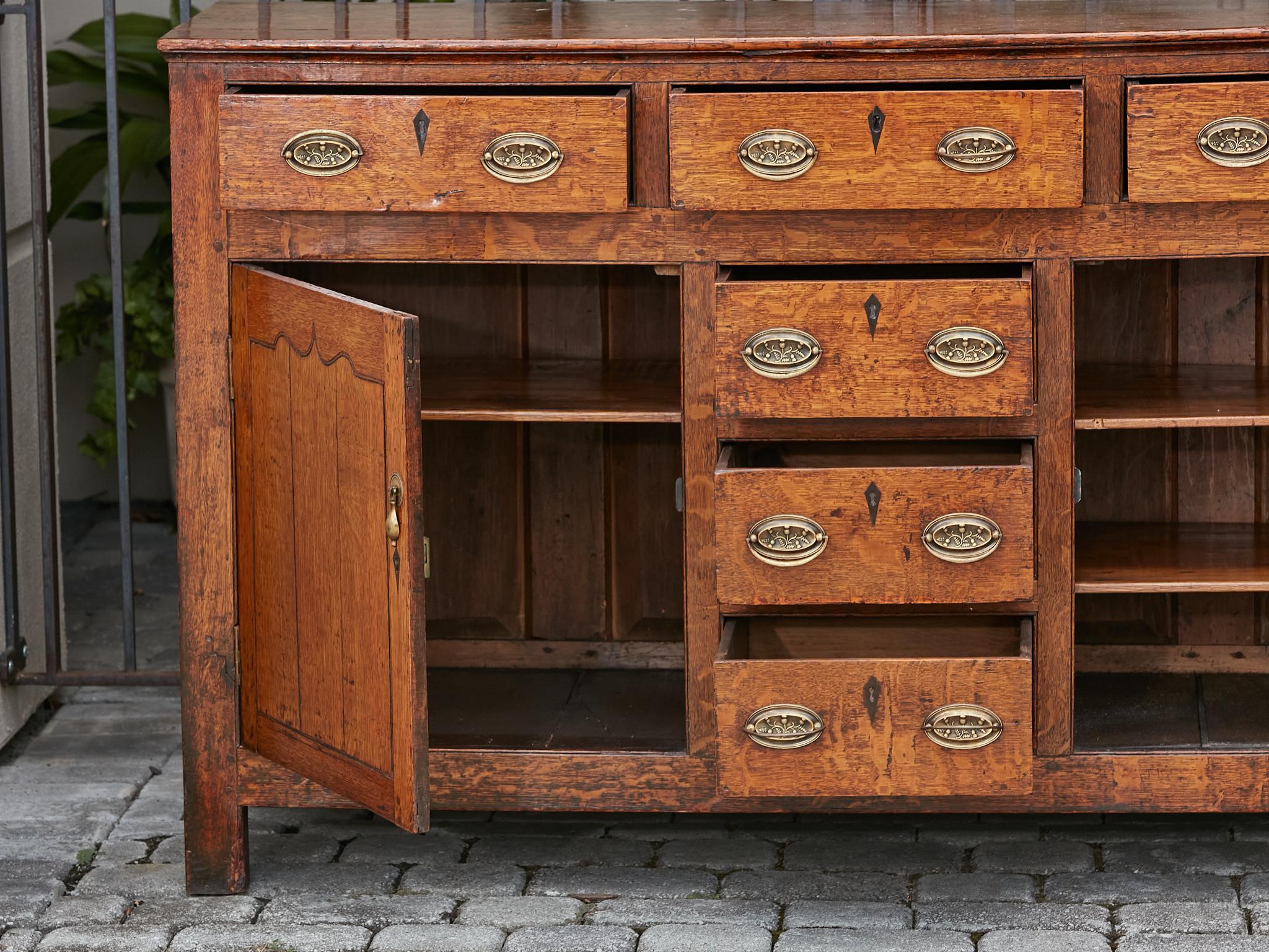 19th Century English Oak Buffet with Six Drawers, Two Doors and Brass Hardware For Sale 6