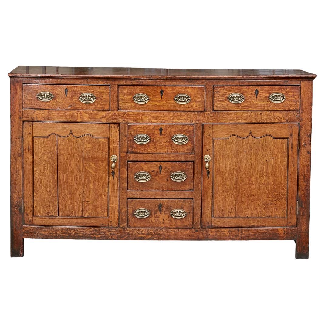19th Century English Oak Buffet with Six Drawers, Two Doors and Brass Hardware For Sale