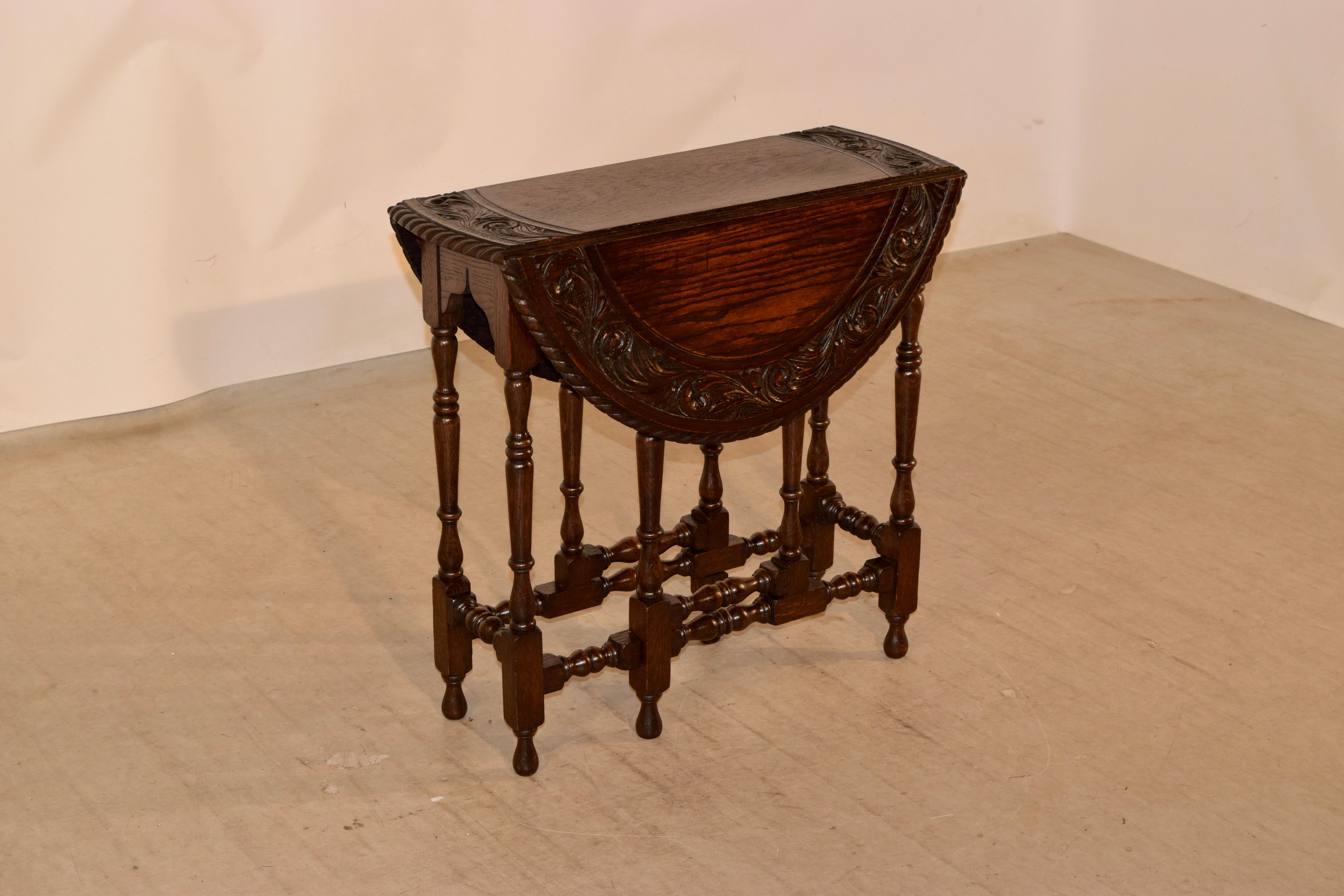 Victorian 19th Century English Oak Carved Gate-Leg Table For Sale
