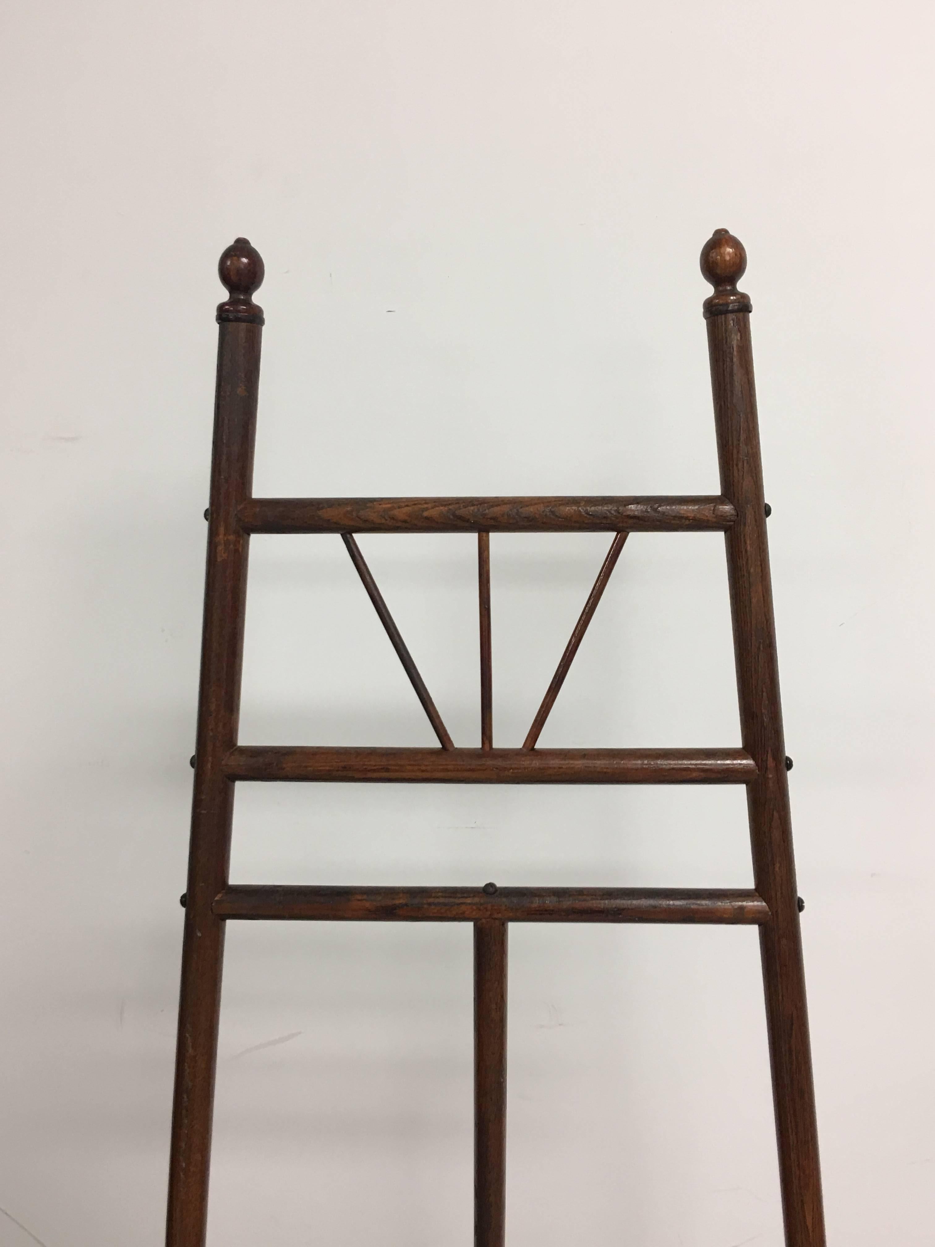 Offered is a stunning, late 19th-early 20th century, English oak easel. Extremely sturdy. Looks as if it's never been used.