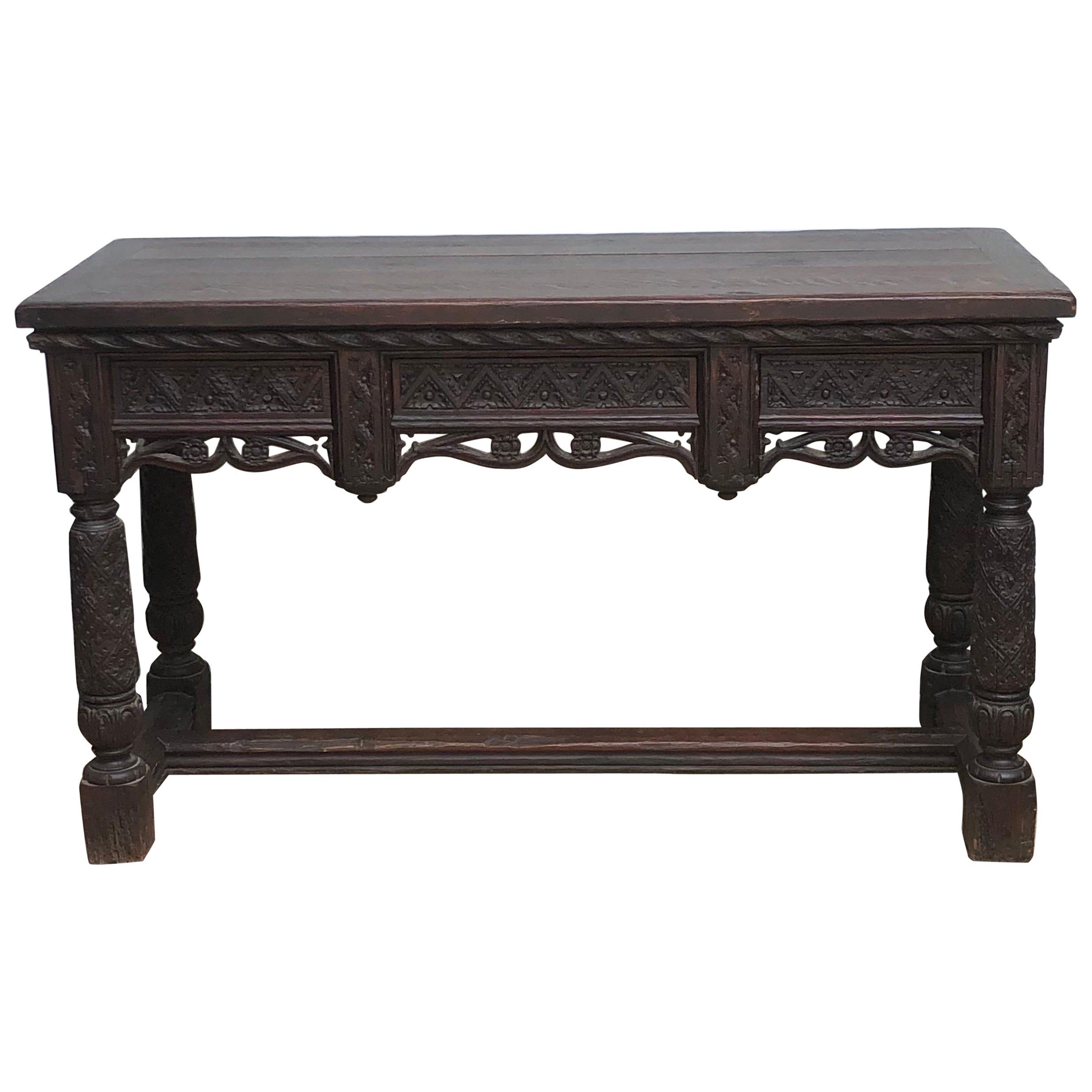 Siglo XIX Mesa de salón consola inglesa de roble de estilo gótico isabelino tallada a mano