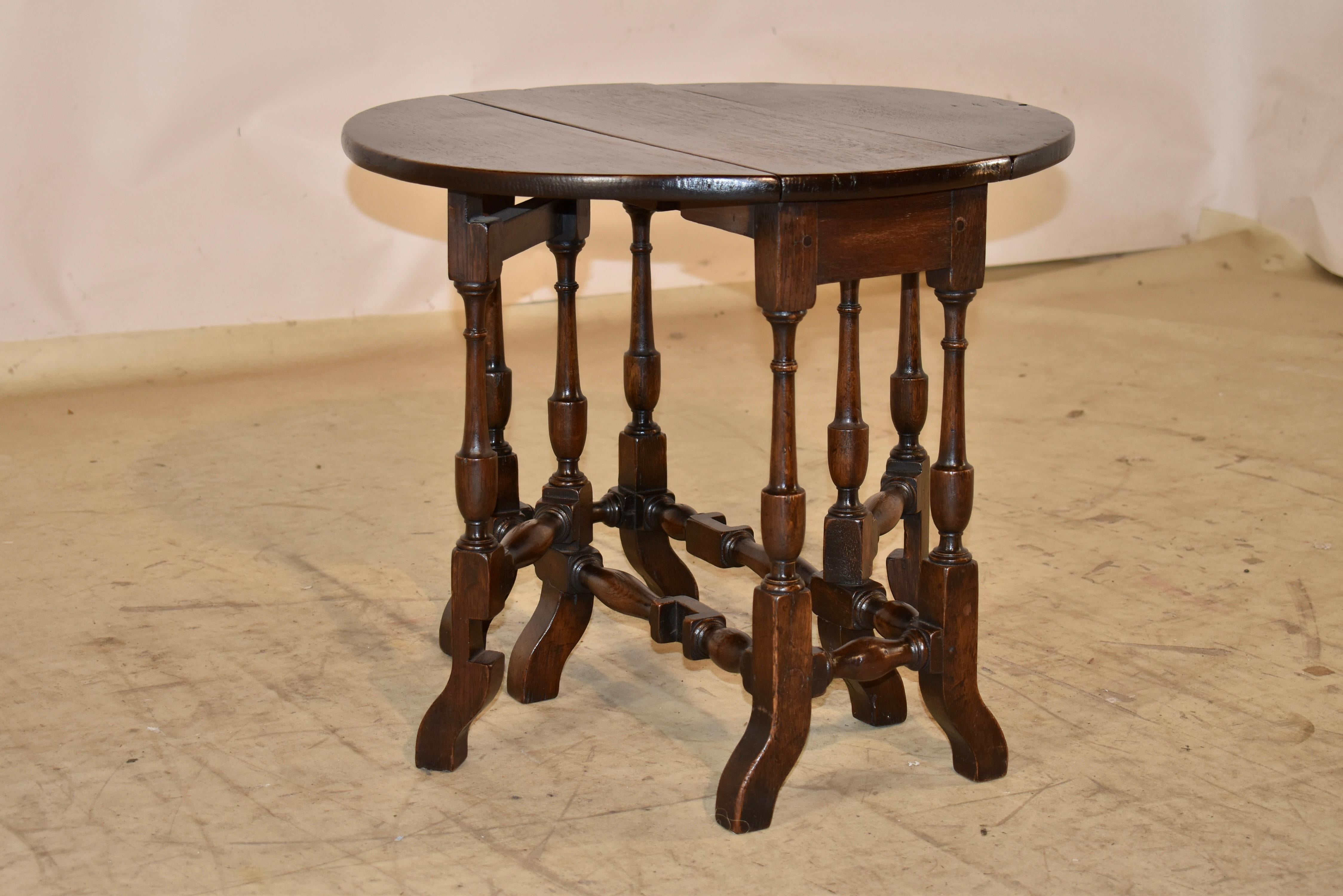 Mesa inglesa del siglo XIX con patas de pórtico de roble Transformado en venta