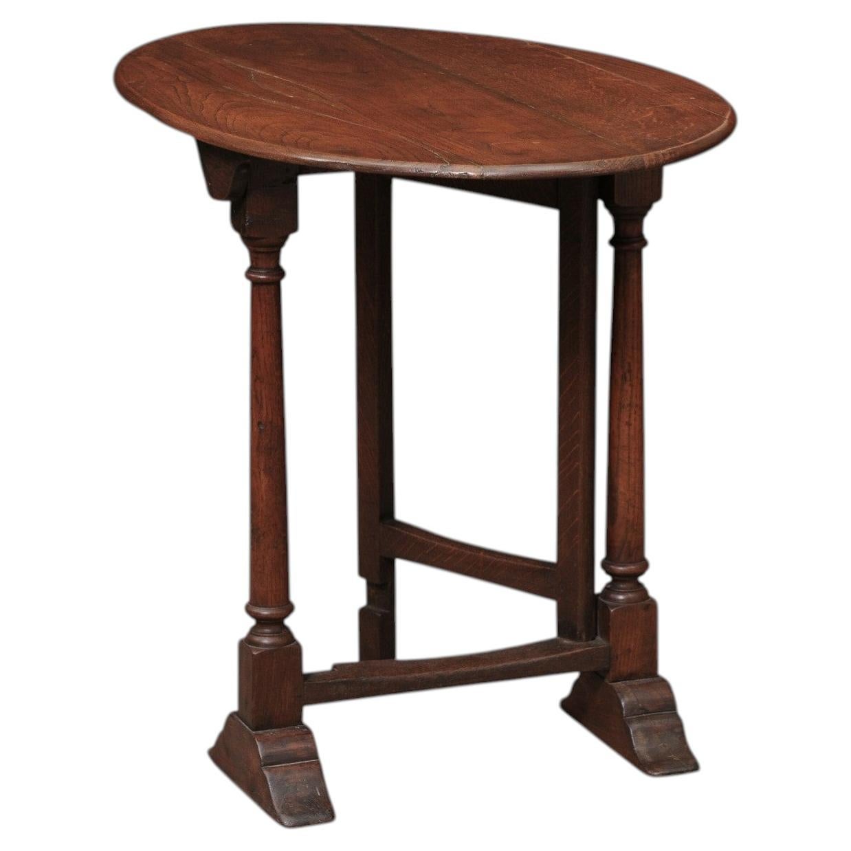 19th Century English Oak Oval Tilt Top Table with Gate Leg For Sale