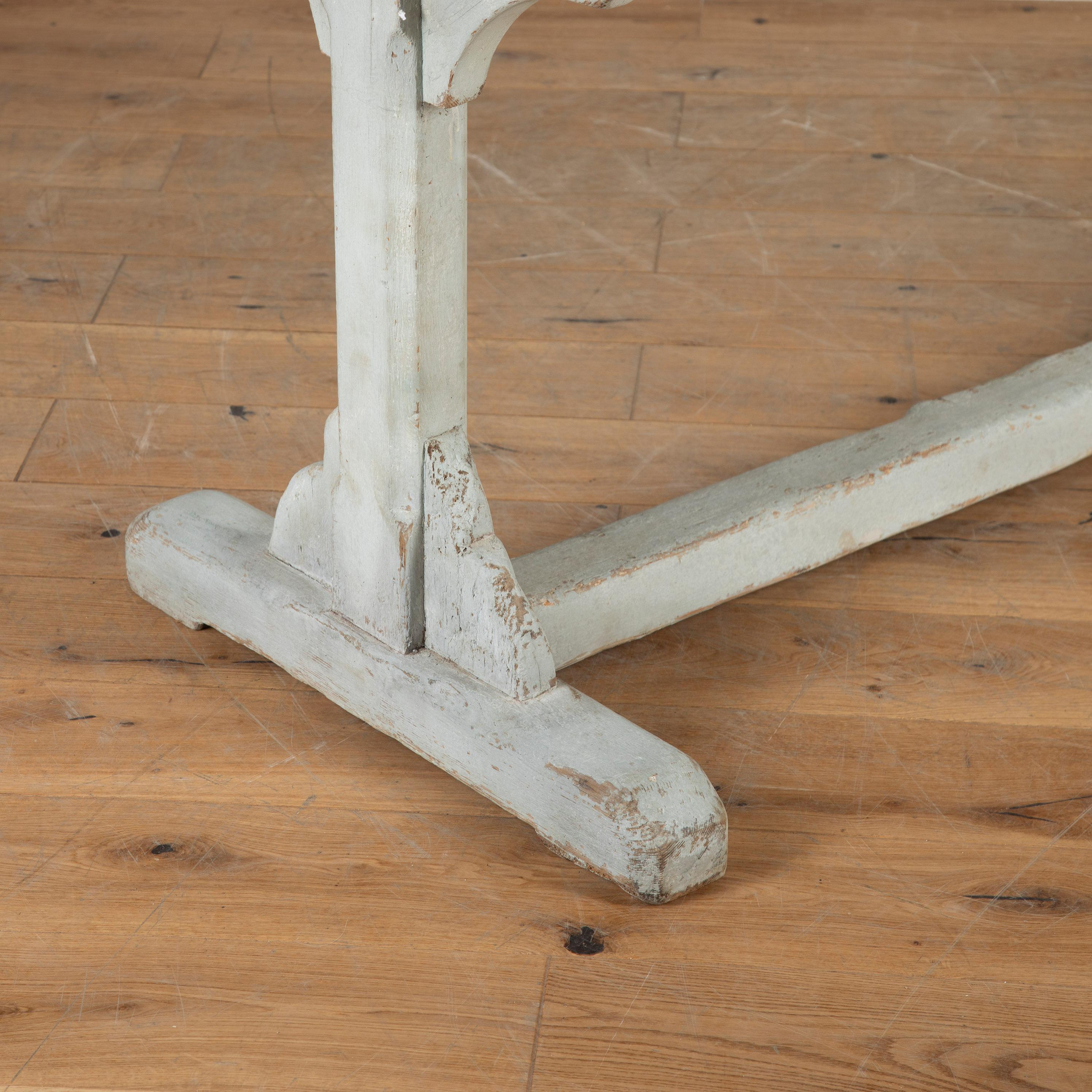 Very attractive 19th century English oak trestle table that could be used as a console, serving, hall or even dining table.

With two thick plank top, this table dates to the 1840s.