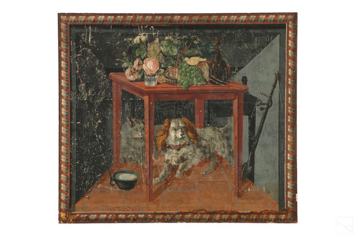 Antique original wallpaper fireboard. An interior scene combining elements of still life and animal art with a dog and cat depicted beneath a table displaying flora, fruit, bread, wine, and other forms. Original wood back replaced and now presented