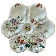 Assiette à huîtres anglaise du 19ème siècle avec fleurs et papillon