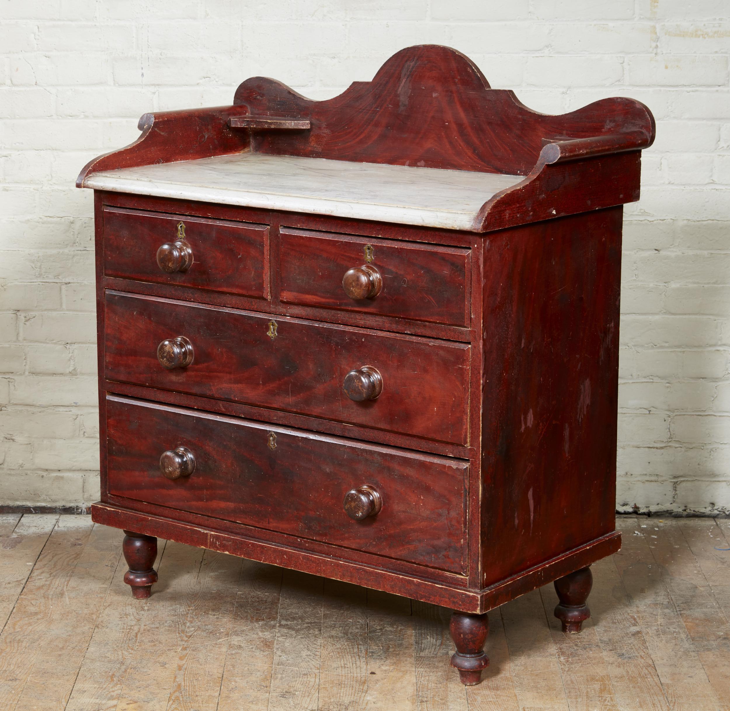 Good mid 19th century English painted chest of drawers having scalloped backspash and scrolled sides over original faux marble painted top over three drawers retaining original turned wooden knobs and standing on turnip turned legs, the whole