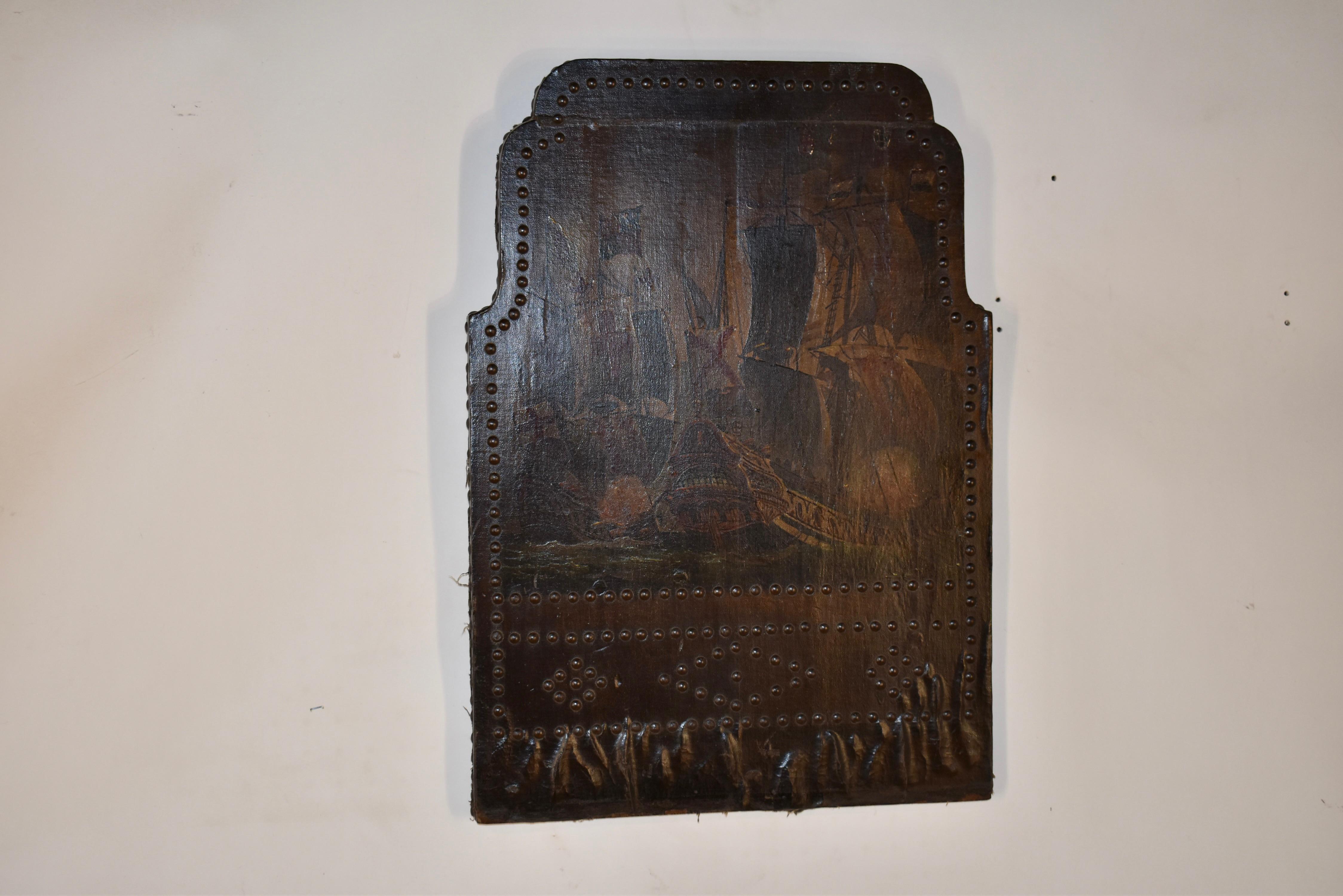 19th century English painting of ships.  The painting is composed on canvas over wood, and is reminiscent of the 18th century style of painting.  The frame is shaped and has beading detail with metal tacks around the frame for added design interest.