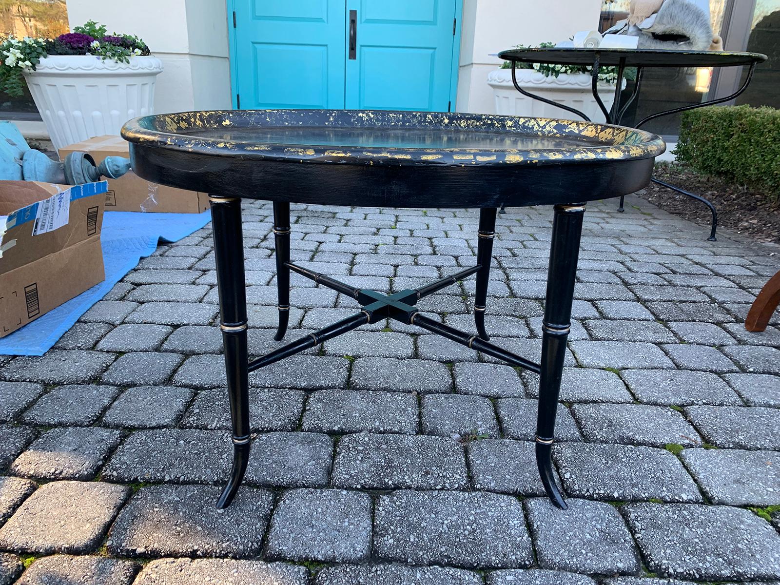 19th century English black and gilt papier-mâché tray on stand by Thomas Illidge, marked, circa 1810.