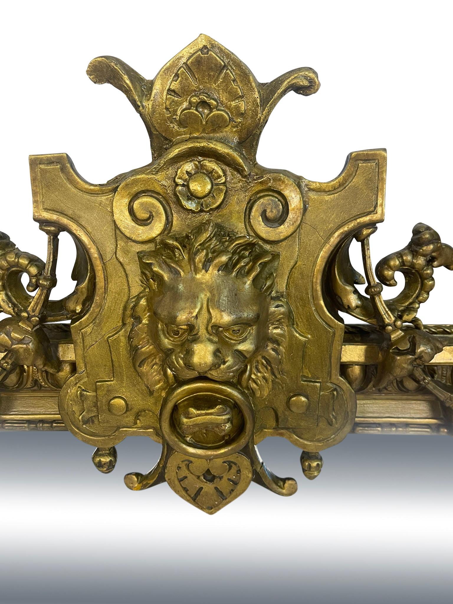 Hand-Carved 19th Century English Pier Mirror Decorated with Lions Head and Figural Griffins For Sale